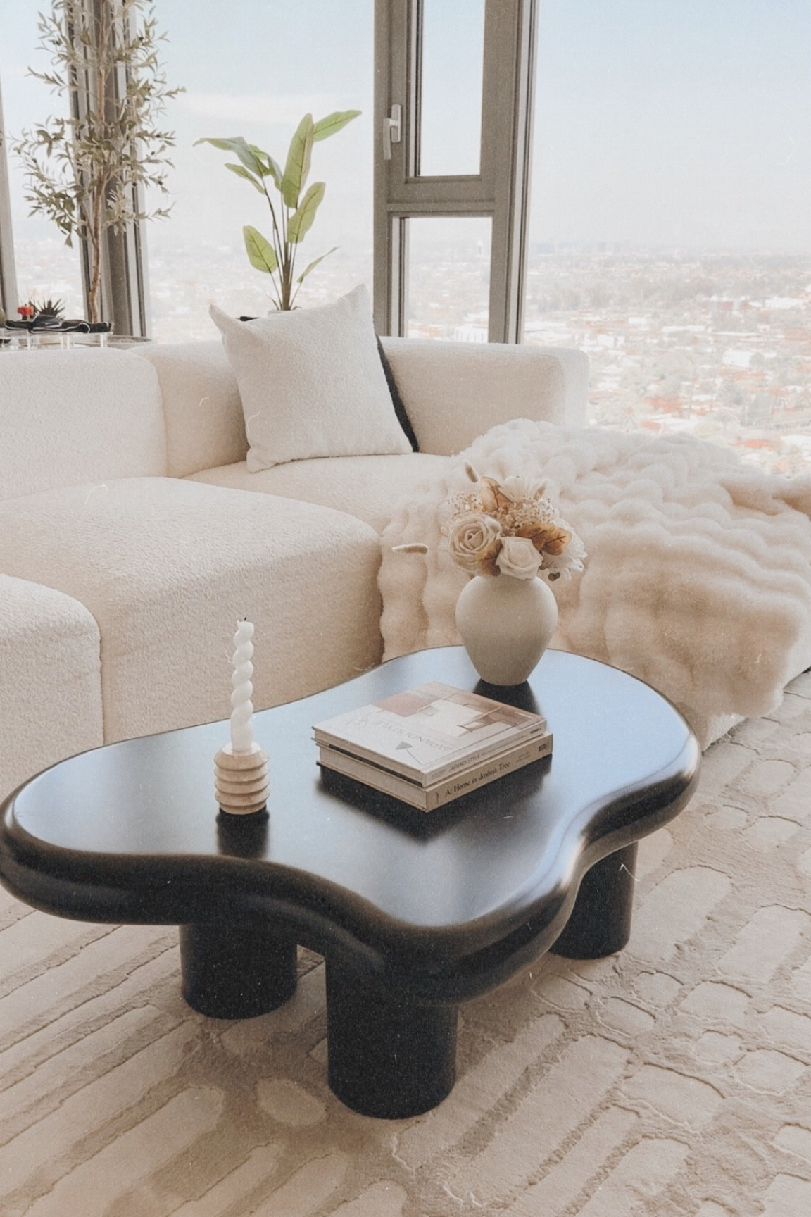 Did someone say coffee table!? 🫣

Honestly, this coffee table is EVERYTHING and more for my living room. I’m obsessed with how perfectly it matches my boucle sofa—like, are they soulmates or what? 😆

But seriously, this setup is my happy place, and I couldn’t love it more 🤍

#LTKHome #LTKStyleTip #LTKFindsUnder100