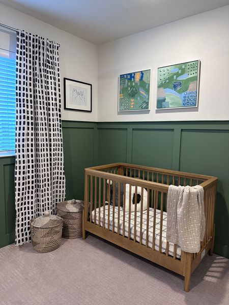 Baby D is sure a lucky little boy. We decided to paint the wall paneling in his room this pretty green to help lend the versatility as the room transitions from a nursery to a boy’s room
