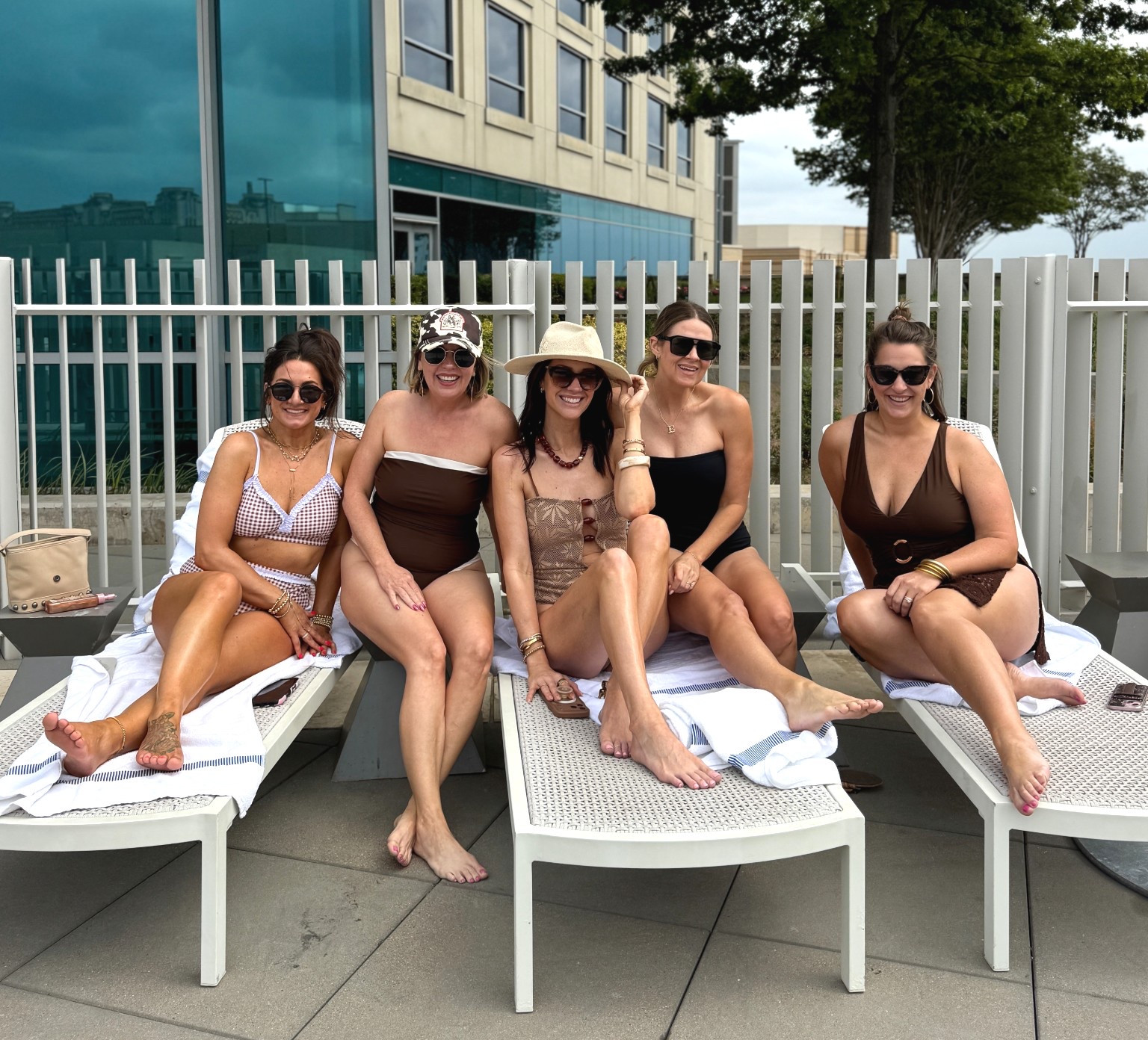Poolside with my girls in our swimsuits. Mine is a medium. It is higher cut on the legs which works well with my body. I am 5’9”. There are small pads that stayed out well. I love the acrylic bead detail  

#LTKTall #LTKTravel #LTKSwim