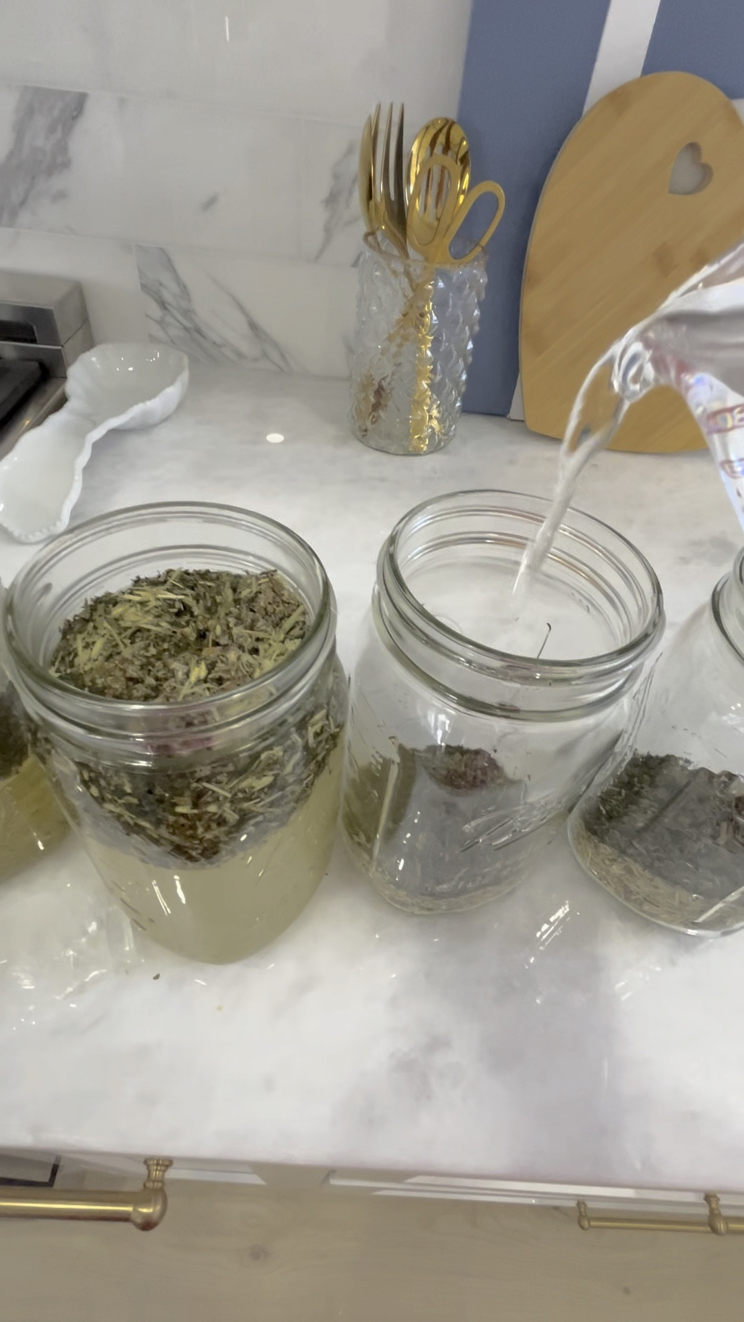 Getting my herbal infusions ready for the next few days. Loving all your feedback! So excited that y’all are jumping on this bandwagon with me! I do 3 tablespoons of oat straw, stinging nettles, and red raspberry leaf for every quart. It’s a very concentrated herbal infusion. Steep for 5 to 8 hours and then drink. I like to add them to my green smoothie! All organic! 

#LTKWatchNow #LTKFitness #LTKHome