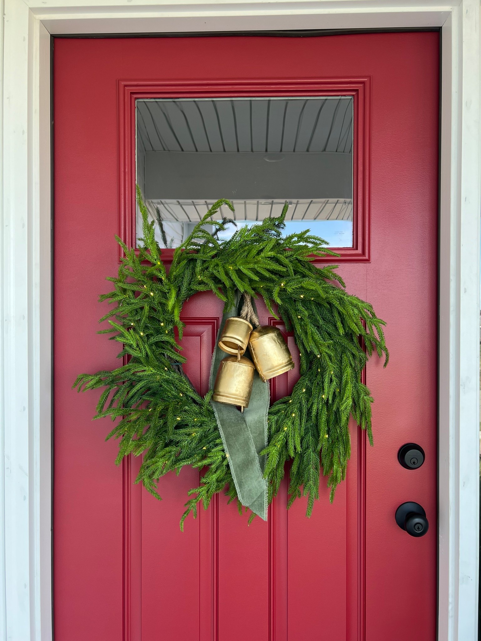This is my favorite Christmas wreath I’ve ever made! It’s a really good quality and currently on sale! #realfeel #norfolkpine #frontdoorwreath #christmas #christmasdecor #christmasstyle #bells #lights #cozy 

#LTKHome #LTKHoliday #LTKSeasonal