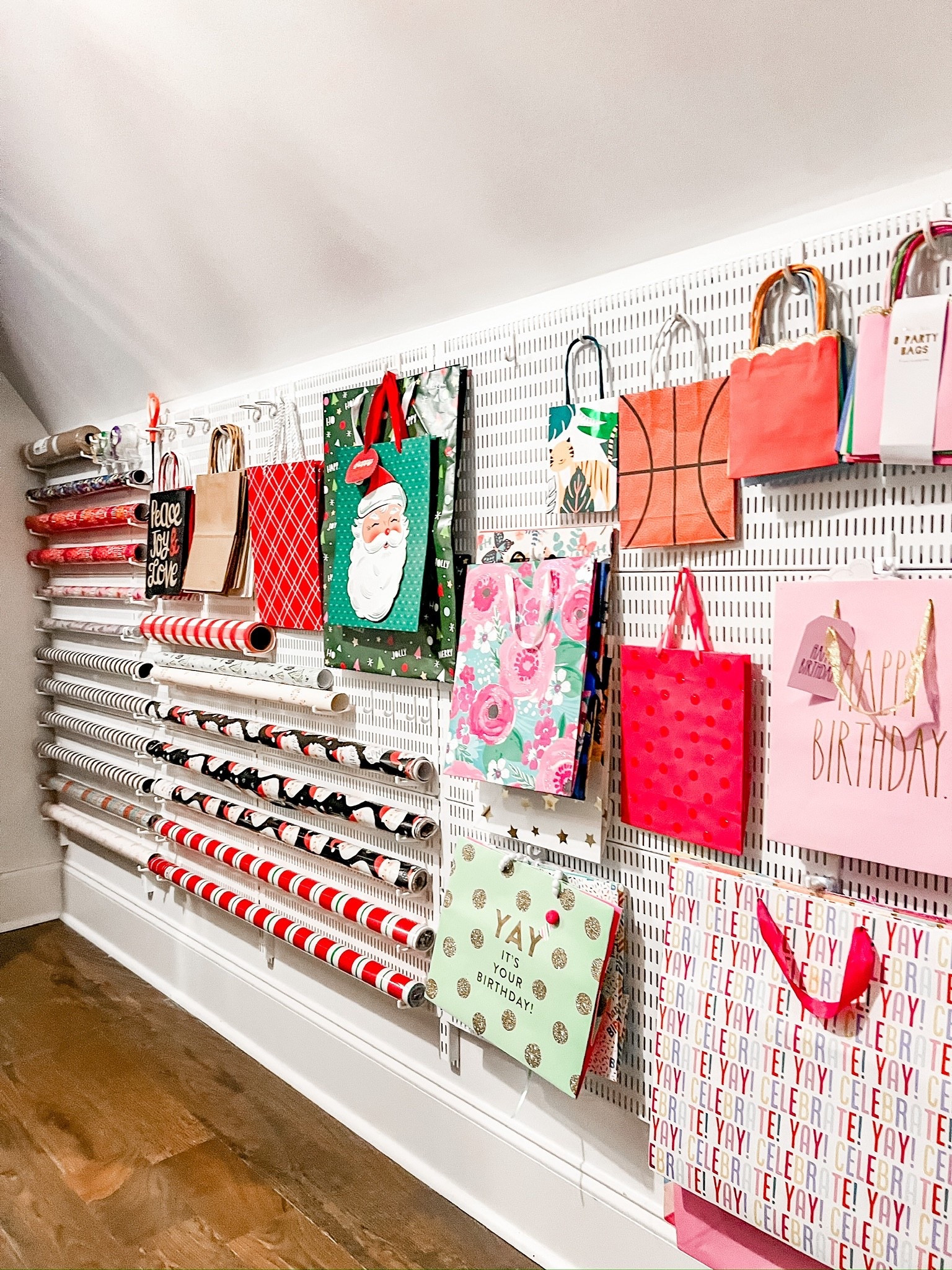 ✨🎄 Imagine opening a closet and seeing: giftwrap rolls, gift bags, and all your giftwrapping accessories ready to grab-and-go! That’s exactly what we created on this guest bedroom wall. That kind of calm IS possible. We do it everyday and can do it for you too. DM us to book a session!

🎁 Comment GIFTWRAP to grab links for our favorite gift wrap storage solutions.

#LTKHoliday #LTKSeasonal #LTKHome