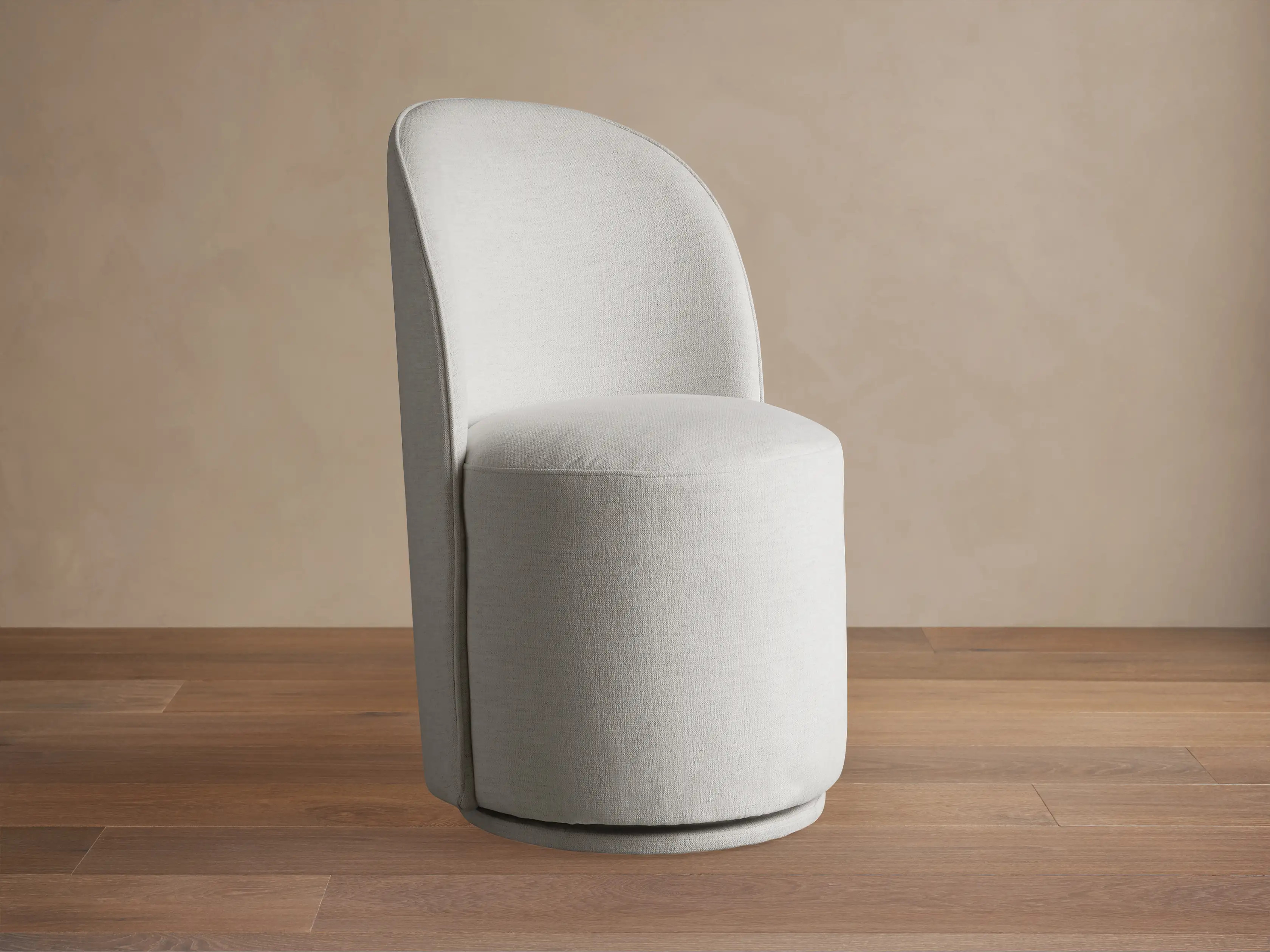Kira Swivel Dining Chair in Nomad Snow | Arhaus