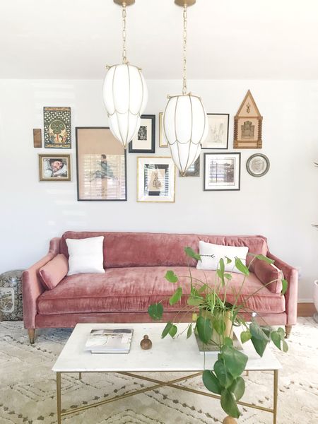 Would you go with a rose colored couch? This couch is from Anthropologie and really made the room in my client’s home.  I think a lot of people would have said- my husband won’t like this- but if you’re not pissing off your husband on a few things are you even decorating?  😆

#LTKhome