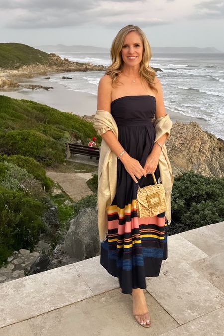 Navy strapless dress with sunset stripes on the coast in Hermanus

A.L.C. Strapless navy dress

Fits TTS 

Gold scarf as a wrap 

Pamela Munson Mini Avis Raffia handbag 


#LTKSeasonal #LTKStyleTip #LTKOver40