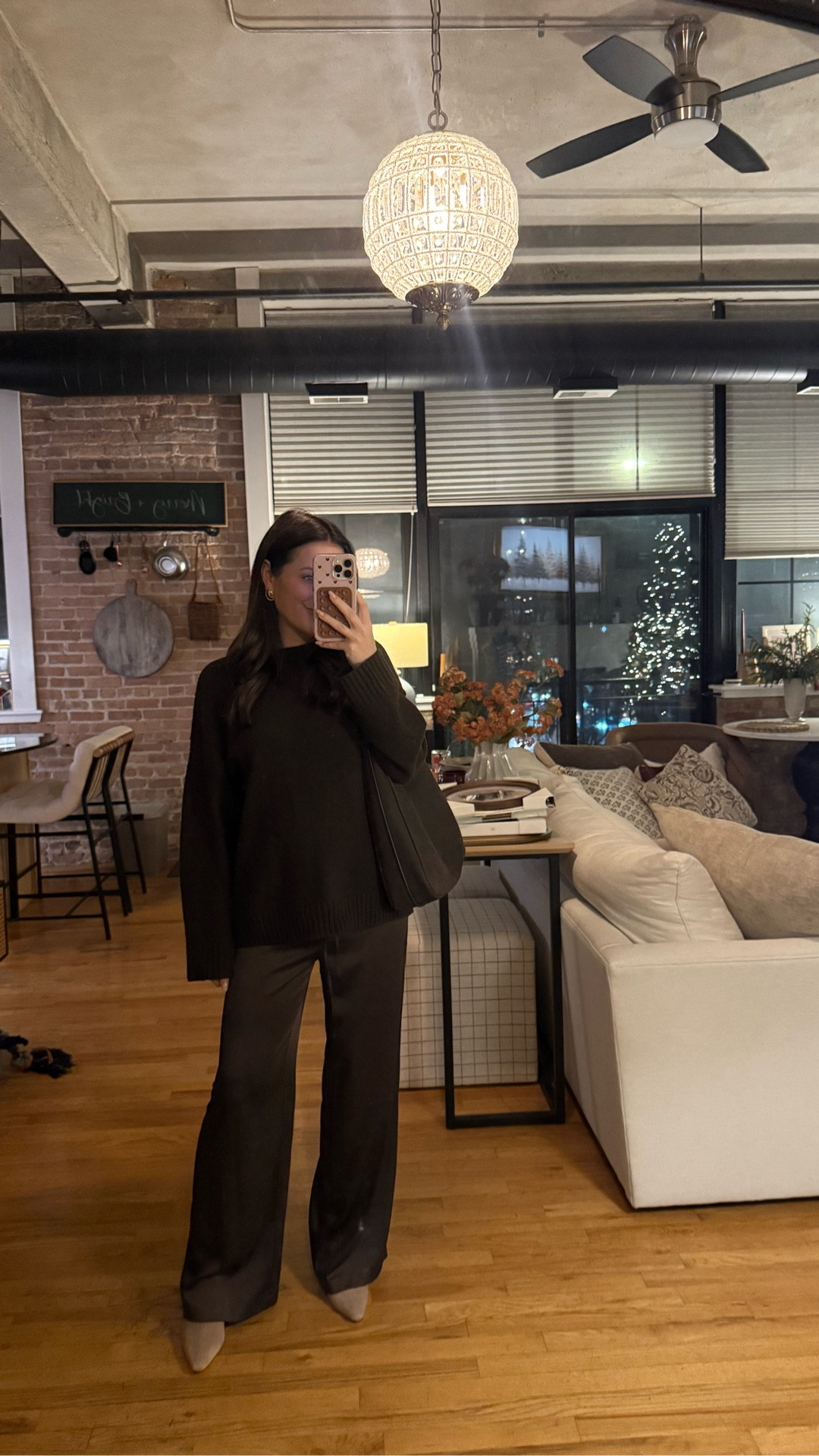 My go to dressier outfit these days at 19 weeks pregnant! Oversized sweater + satin stretchy pants. I sized up to a L in the sweater and S in the pants 

#LTKStyleTip