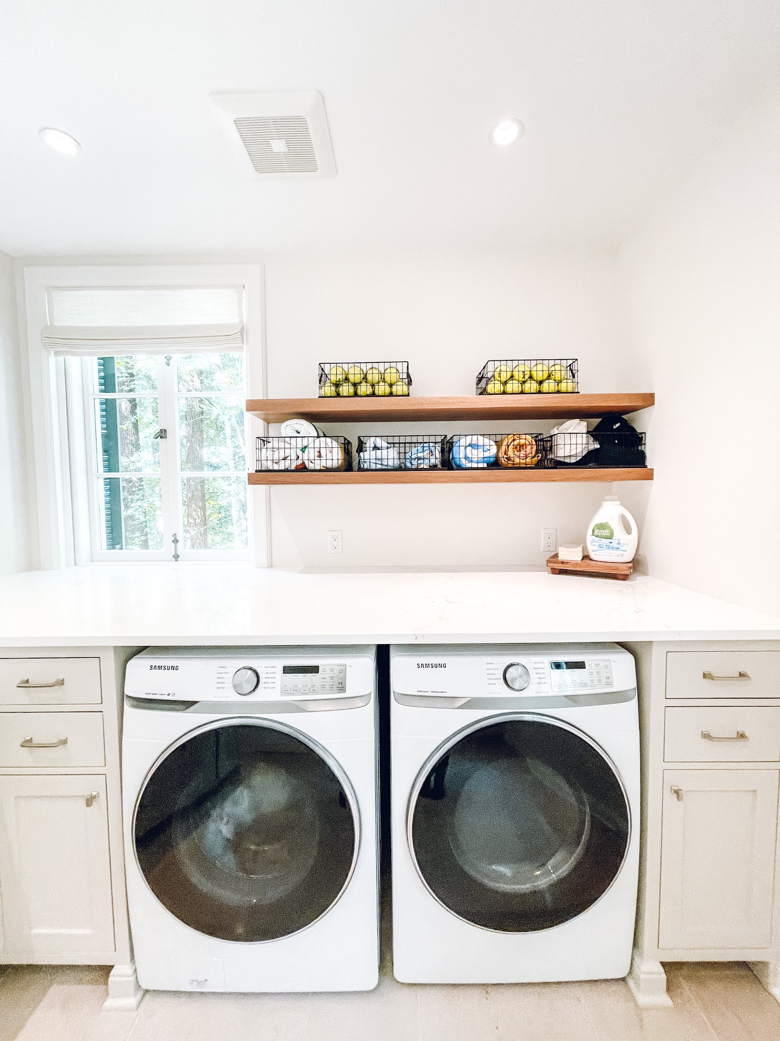 Laundry room organization. The Container Store Stacking Wire Basket. Neat Method Grid Baskets. Threshold Floating Wood Shelf. Amazon Farmhouse Wood Tray. Amazon tennis balls✨

#LTKhome #LTKfamily #LTKkids