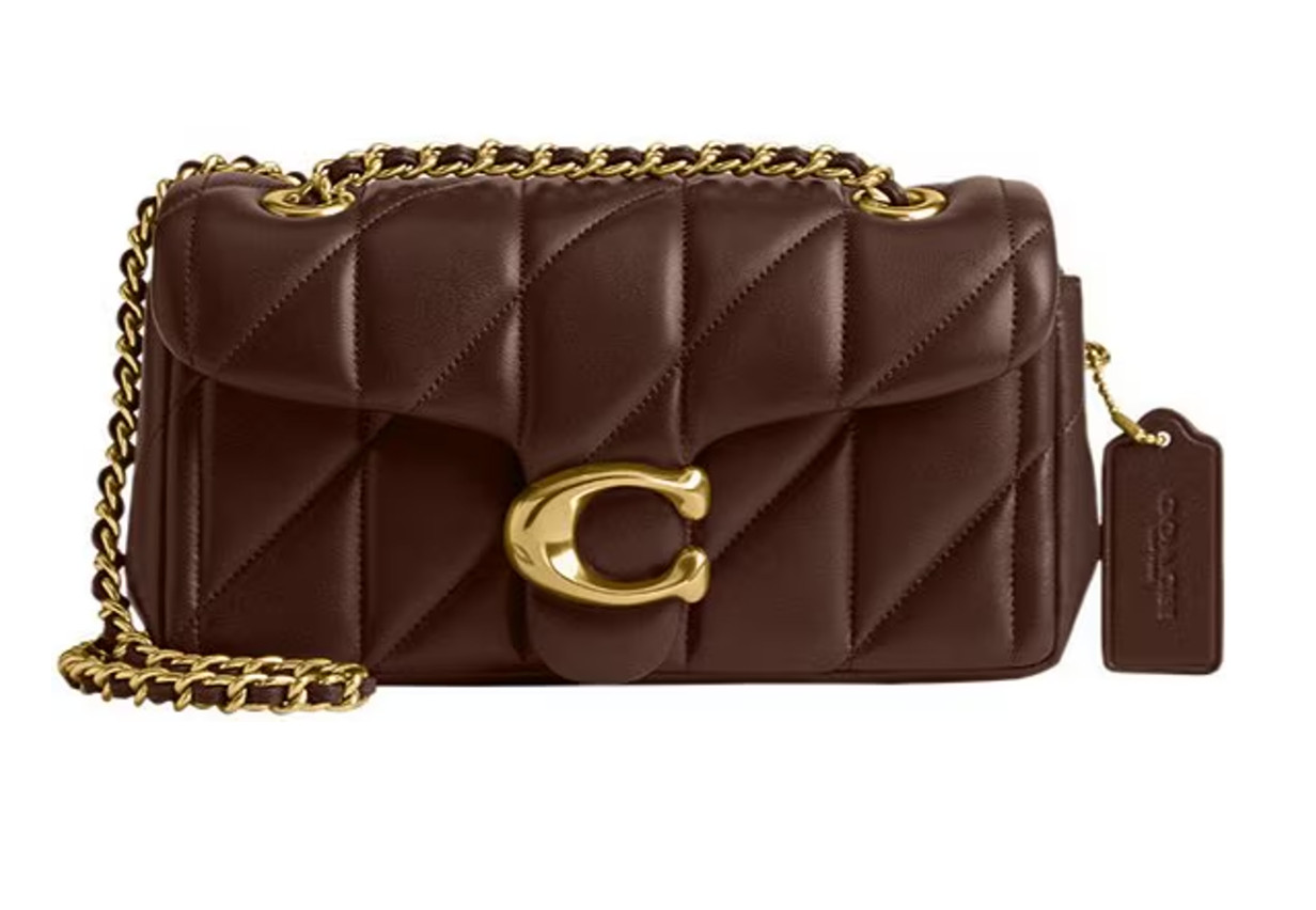 COACH Tabby 20 Quilted Chain Shoulder Bag: Indulge in the epitome of luxury with this stunning COACH Tabby 20. Crafted from buttery-soft nappa leather and adorned with iconic quilting, this bag is a true masterpiece. The versatile chain strap allows you to wear it as a shoulder bag or crossbody, while the spacious interior keeps your essentials organized. 

 #LTKGiftGuide #LTKHoliday #LTKBeauty