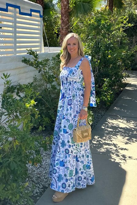 Love this, Sheridan French 
Beautiful blue and white maxi dress paired with handwoven rattan mini handbag and cork wedges 
It’s the perfect dress for a warm weather, getaway, beach, vacation, Easter, and more! 

#LTKtravel #LTKFind #LTKSeasonal