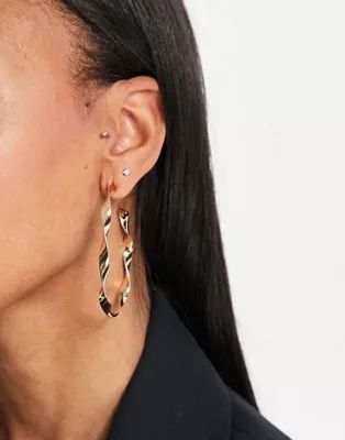 ALDO Qiren twisted hoop earrings in gold | ASOS (Global)