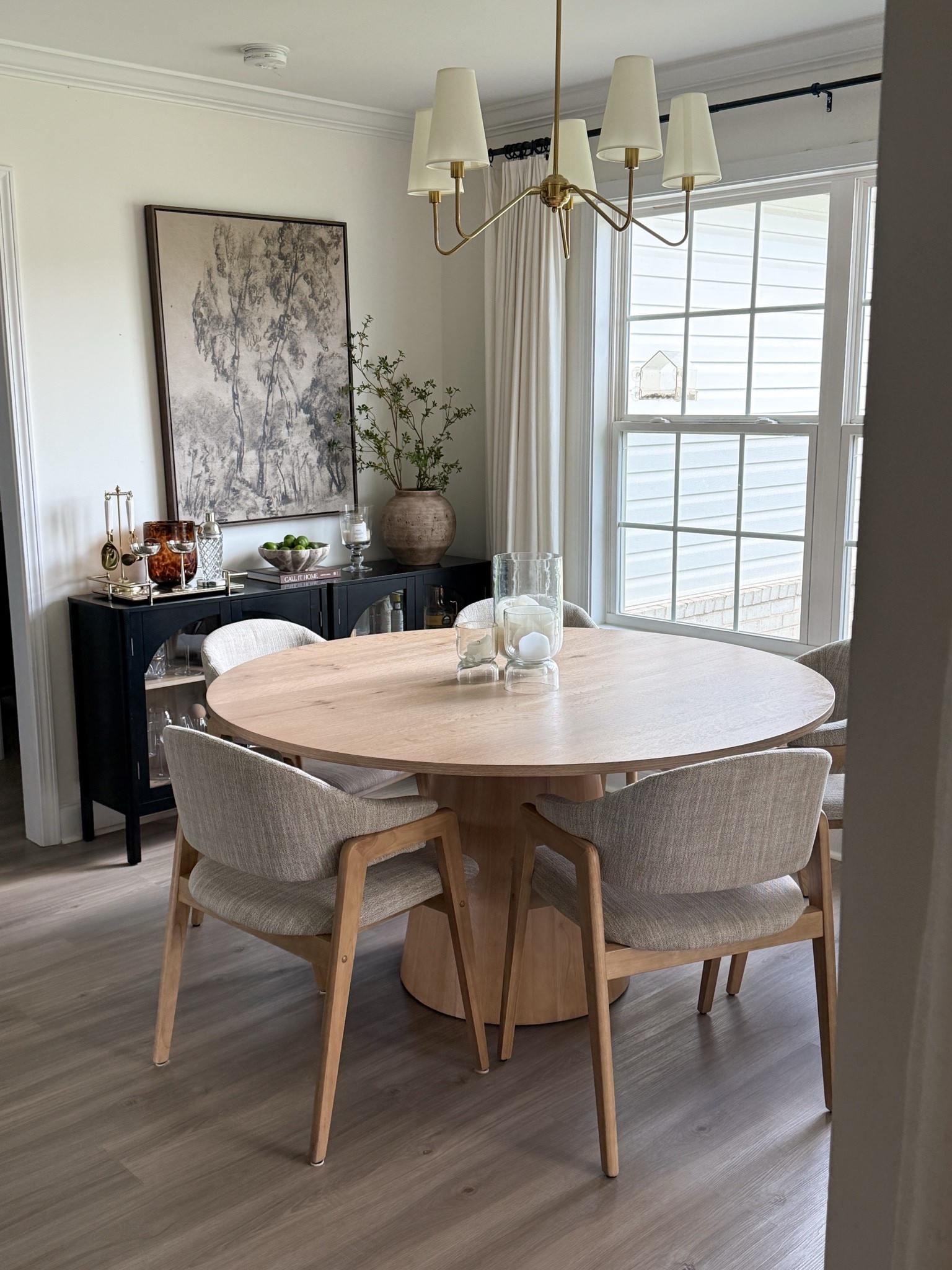 Canvas frame in the size 40x30. The print is from CollectionPrints.

Round Dining room table. Upholstered dining chairs.

#LTKHome