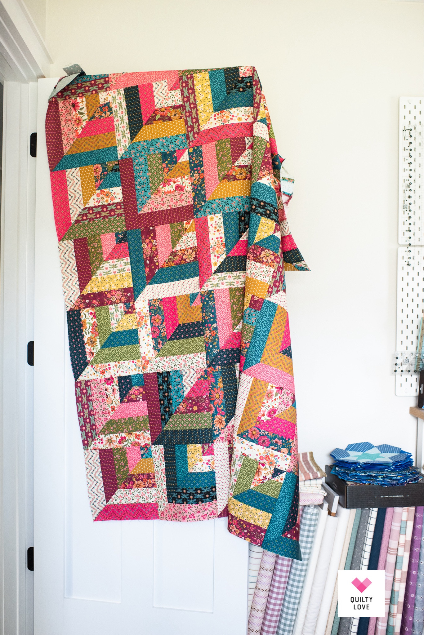 Lucky Log Cabins sewn up in Sagewood fabrics.  Quilt pattern available in the Quilty Love pattern shop. 