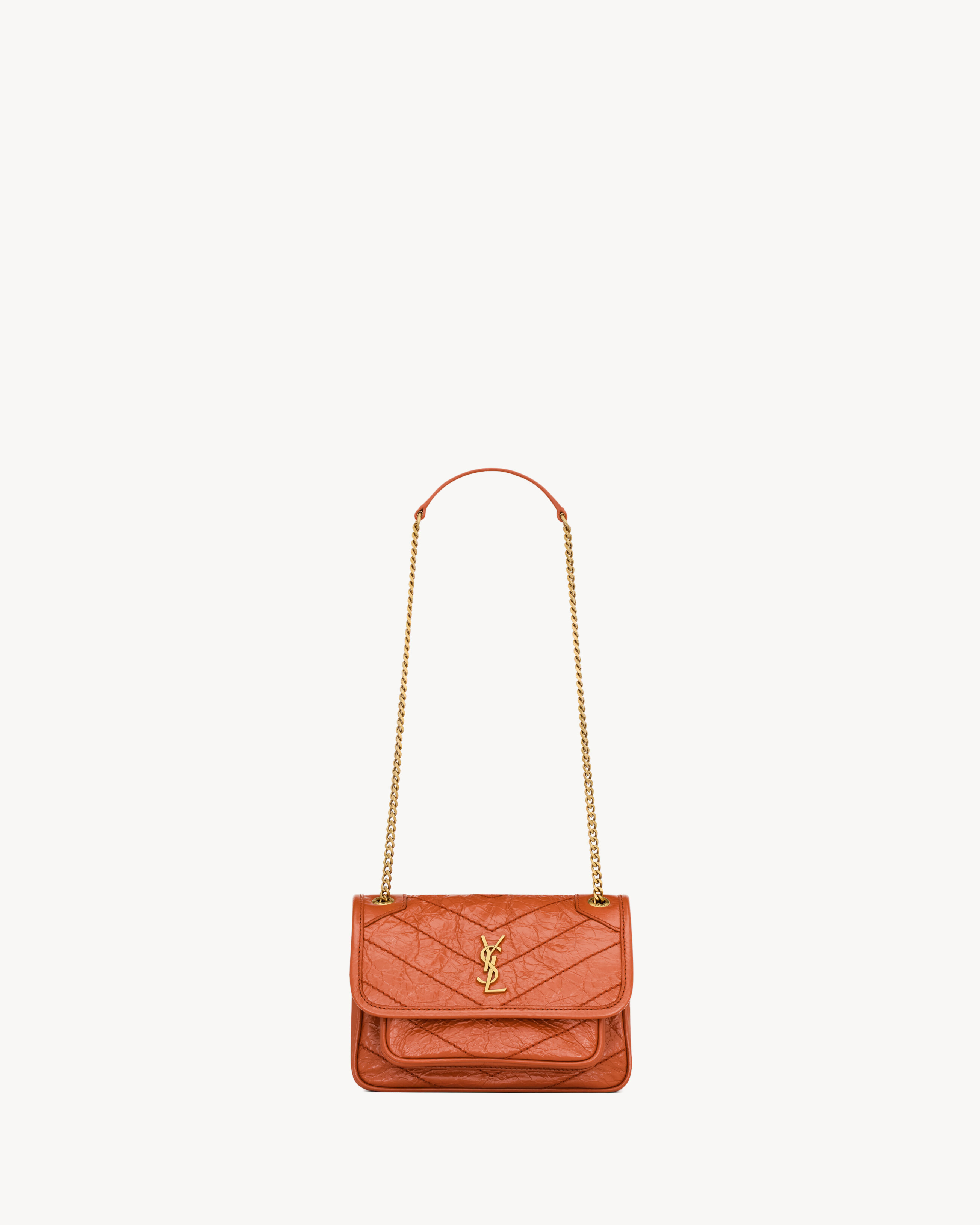 NIKI mini in vintage leather in Orange | Saint Laurent | YSL US | Saint Laurent Inc. (Global)