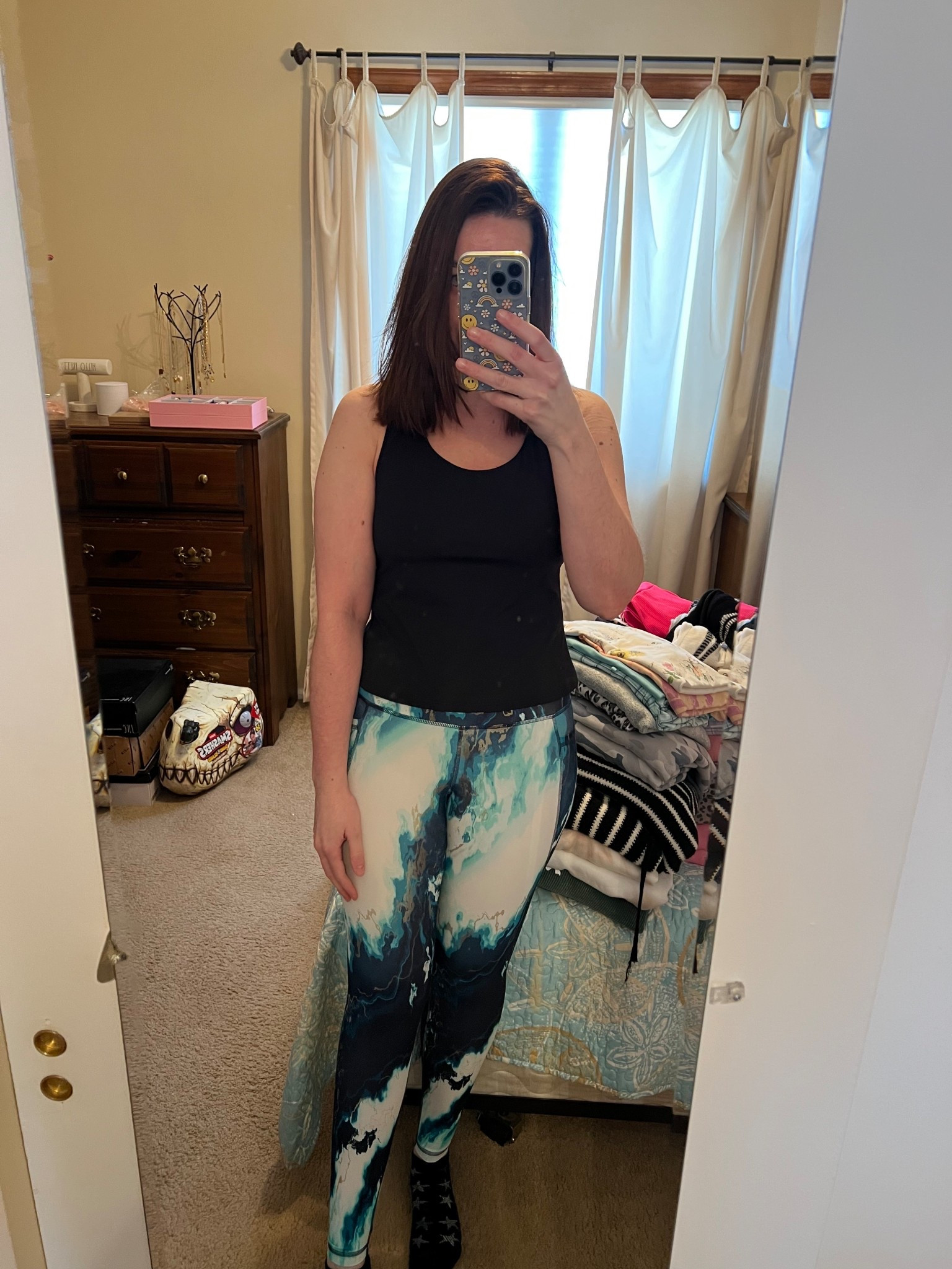 Black workout top (m). Multicolor turquoise leggings (s). #workouttop #top #blacktop #blackworkouttop #leggings #multicolorleggings #turquoiseleggings #pilatessocks #fitnessgear #activewear 

#LTKfitnessgoals #LTKSeasonal #LTKActive
