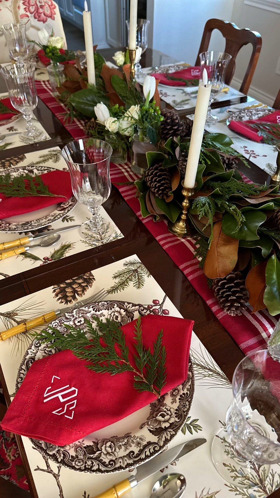 It is so much fun mixing high and low pieces to create a fun and festive table. This Christmas tablescape started with these paper placemats from @hesterandcook.  

My last visit to Nashville I spent a whole lot of time and a whole lot of money 😂 in their amazing store. If you’re ever in the Nashville area, you have to go check it out. 

I loved using my @by_spode Delamere with simple monogrammed napkins. A magnolia and fresh greenery centerpiece and small vases filled with white roses completes the table.  Christmas decor and Holiday tables are my favorite!

#LTKHome #LTKHoliday #LTKSeasonal
