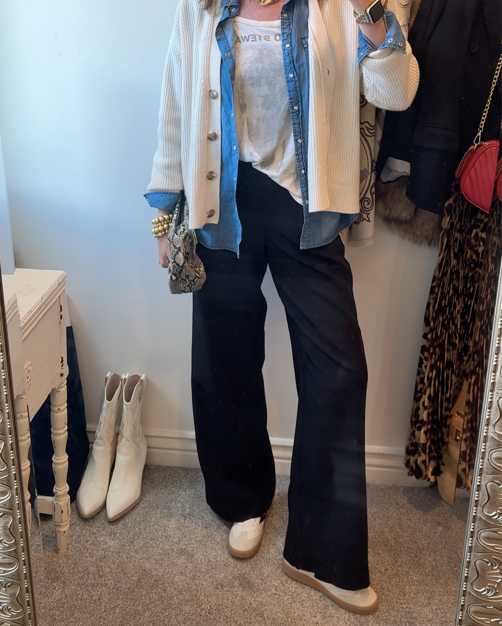 #7 in the concert/graphic tee styling series…

Not just a tee and track pants✔️
Layers is what takes this look  from basic to fun.

Sweater add texture (cashmere cardigan by quince) 20% off with code DARCY20 tts

Denim shirt left unbutton adds not texture and depth- light weight and perfect for summer this one is by Chicos and is on sale ! Tts 

Blonde oversized super soft tee by junk food (mines super old) linked similar 

Great on trend sneakers, black and white and so comfortable! By yellow box

Jewelry is a mix of French Kande (can’t link) it’s on my blog 

Lisi lurch gold beade bracelets
And small earrings 

Snake skin clutch
Old Anthro linked similar

#LTKSaleAlert #LTKOver40 #LTKStyleTip