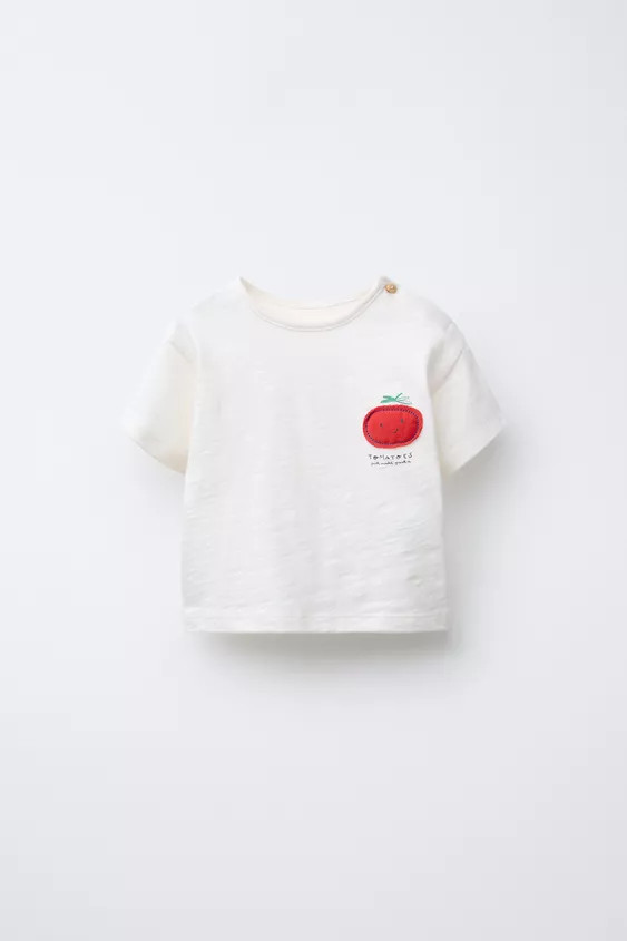 T-shirt with round neck and short sleeves. Button closure at shoulder. Tomato patch detail on che... | Zara US