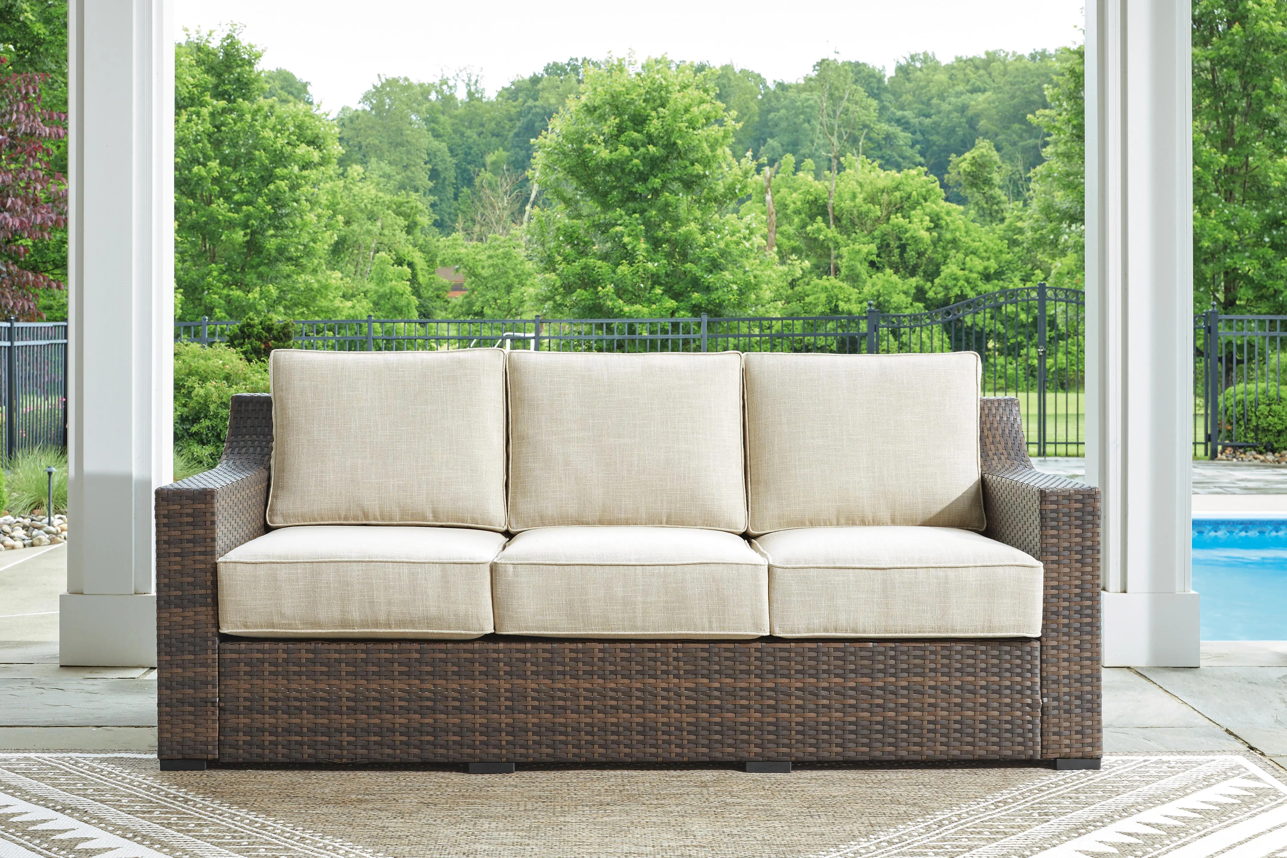 Wellingtons Peak Outdoor Sofa with Cushion, Beige/Dark Brown | Ashley