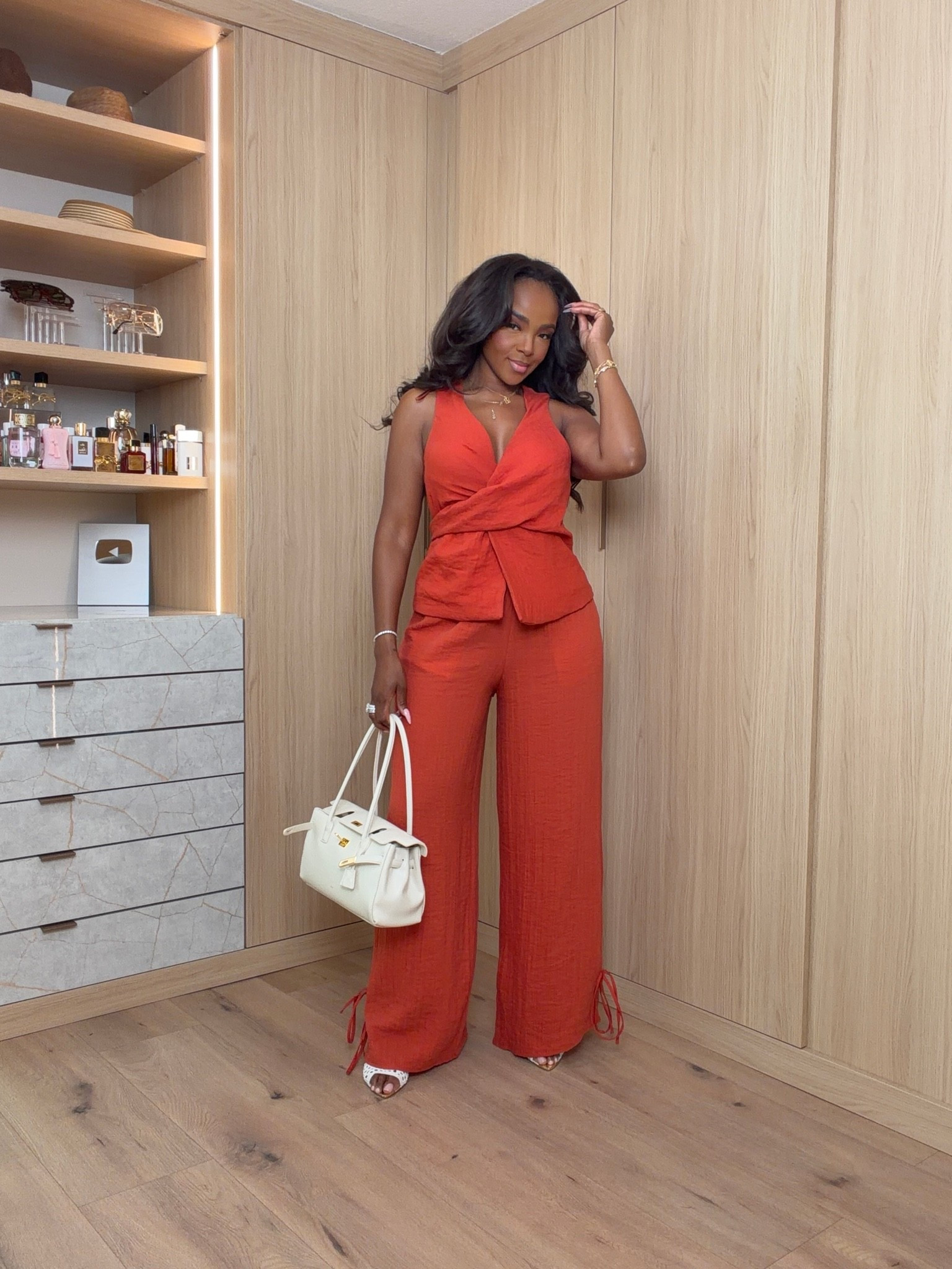 Hi Babes!

This set is a summer showstopper ❤️✨

The rich sunset-red color is absolutely stunning, the waist detail creates the most flattering silhouette, and the flowy wide-leg pants make it feel effortless while still looking incredibly elevated. This is one of those outfits that looks designer-inspired without the designer price tag.

Where to wear this:
• Vacation dinners
• Resort nights
• Summer parties
• Birthday celebrations
• Rooftop cocktails
• Girls’ night out

Style tip: Pair it with neutral heels, gold jewelry, and a structured white bag for the perfect polished summer look.

Undergarments: Nude seamless bra and nude seamless underwear.

Everything is linked below

xx Kira | IG: KirasFashionFinds

34D - 27 - 40 • Size Small or 4