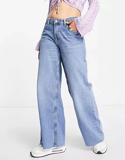 Bershka baggy low waist jeans in mid blue | ASOS (Global)