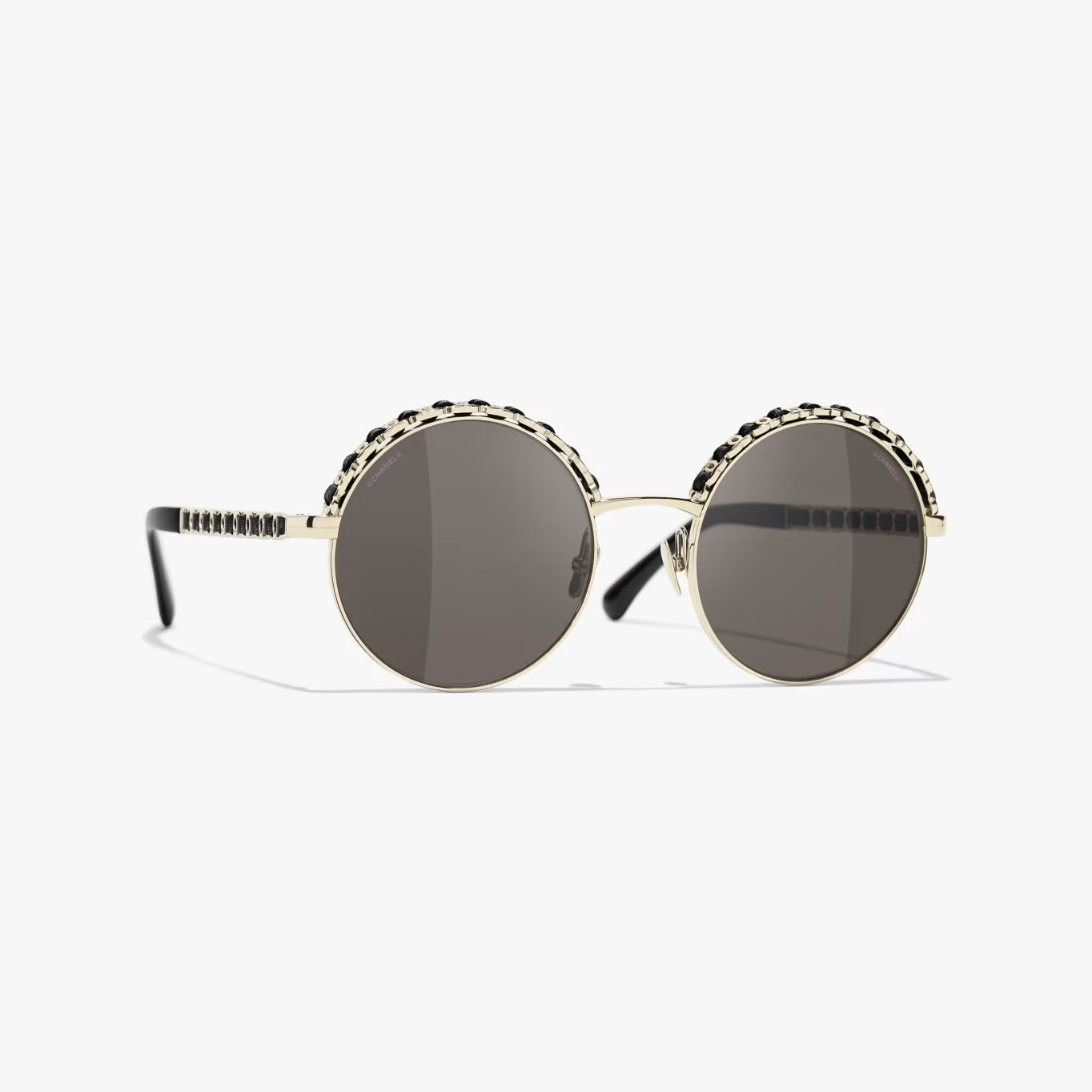 CHANEL Sunglasses: Round Sunglasses, metal & calfskin — Fashion | CHANEL | Chanel, Inc. (US)
