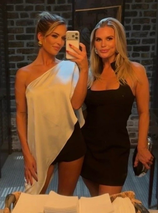 Madison LeCroy's black high collar Dress adds drama to this confident masterpiece of a mini dress. The sleeveless silhouette flows backwards into a racerback style at the back. Structured through the waist to flatter your figure and show off your legs, while a side zip allows for easy wear. If you have a larger bust we recommend sizing up.