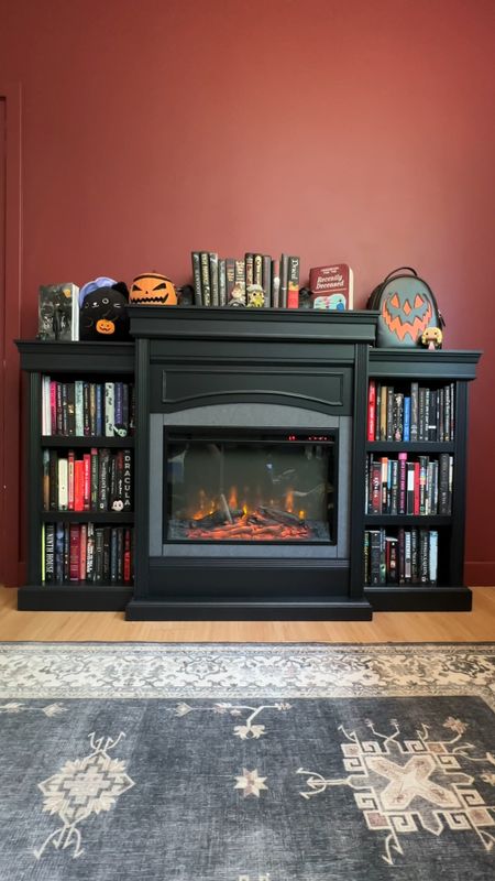 
A little home diy! I wanted a cozy place to read all of my favorite spooky books so i got this adorable fireplace / bookshelf combo and stocked it with my favorite gothic romance and horror novels! Loved using backdrop for this rich red paint. And the fireplace is currently on sale  

#LTKHome