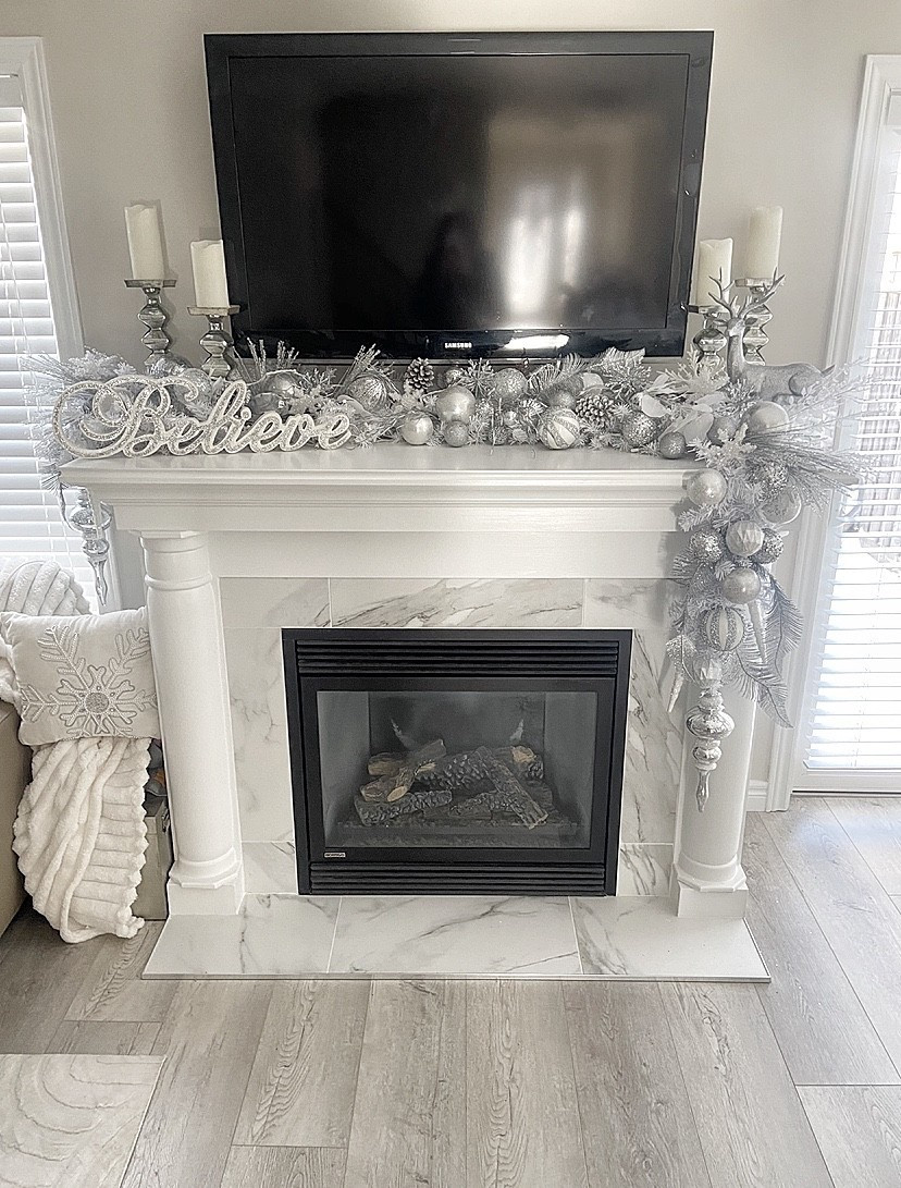 #WhiteAndSilverGarland #Fireplace #ChristmasDecorations #WhiteAndSilverChristmasDecor 

#LTKhome #LTKholiday #LTKwinter