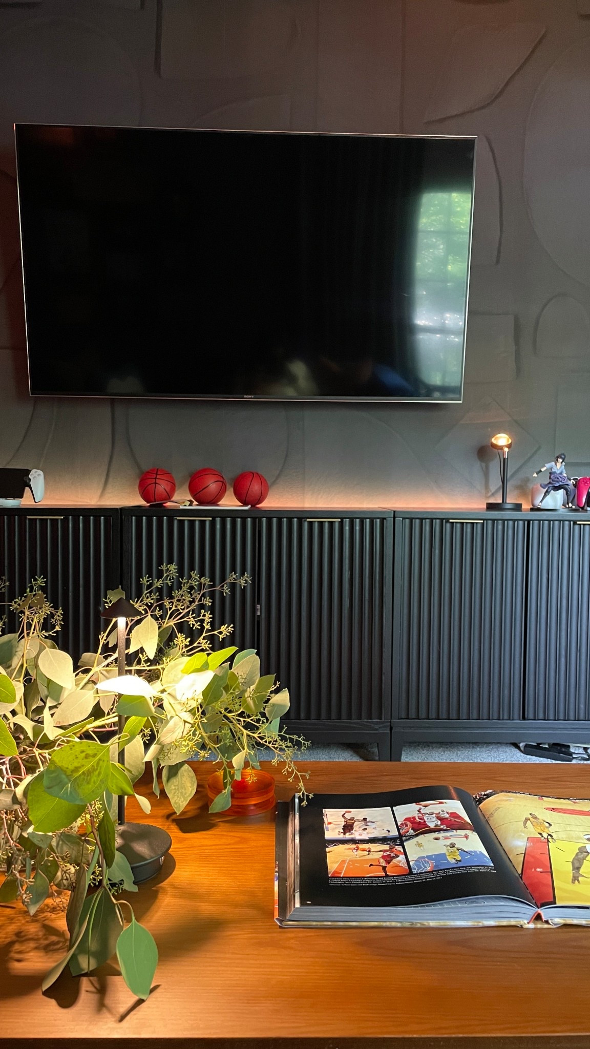 We combined three cabinets from Nathan James to make one large media console for the TV 

#LTKStyleTip #LTKHome