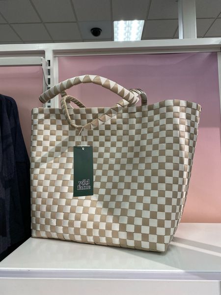 The cutest checkered beach bag from Target!! Obsessed. Also comes in a pink/blue print and multicolor option. Super roomy to hold all the things for the beach or pool and can easily brush off sand or water. Trendy, affordable, Target find.

#LTKitbag #LTKFind #LTKunder50