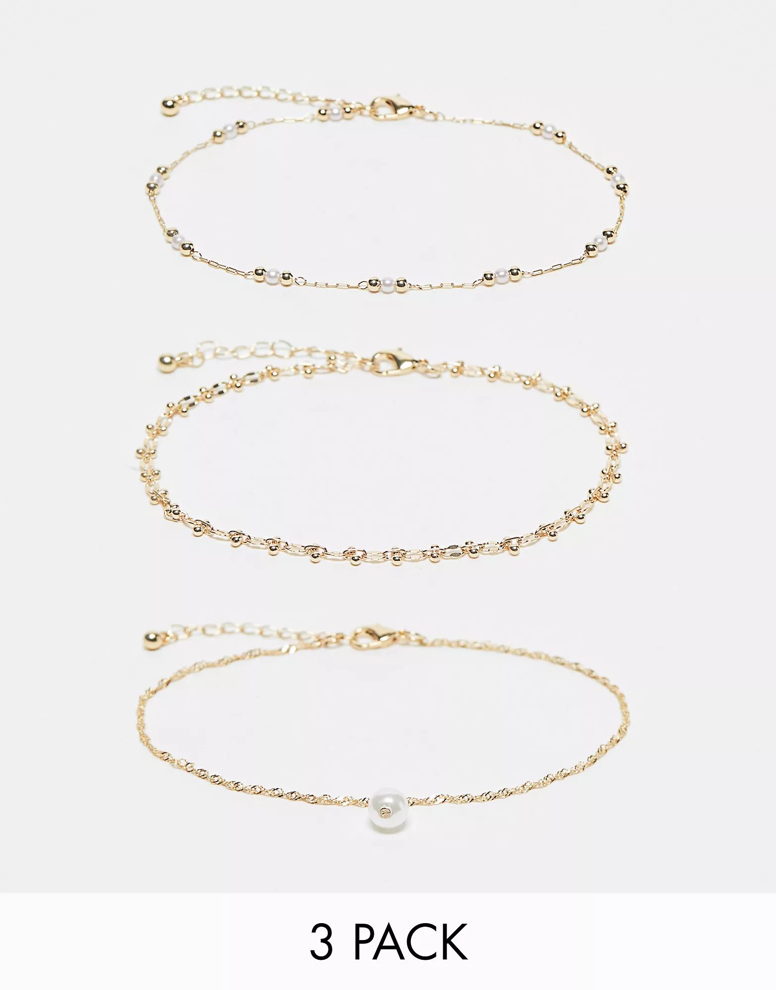 ASOS DESIGN Curve pack of 3 anklets with faux pearl and ball design in gold tone | ASOS (Global)