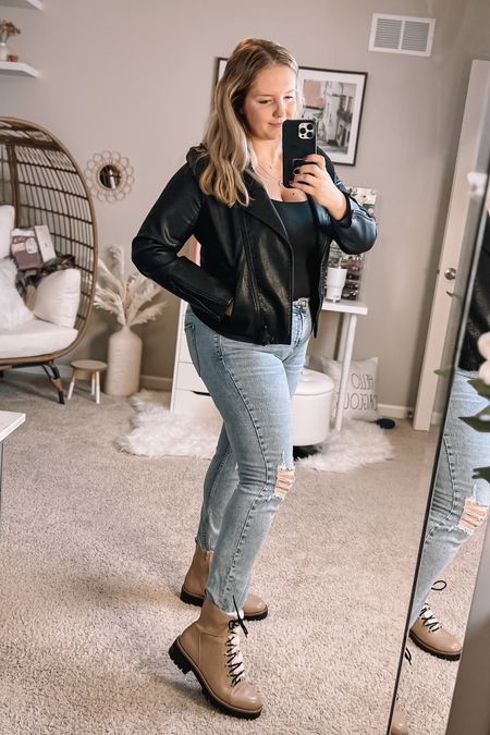 Cute faux leather moto and light denim distressed denim look for winter. Dark and light contrast with a minimalist classic look with style. Tan sherpa hiking boots with black laces. Neutral boots of dreams!

#LTKunder50 #LTKcurves #LTKSeasonal