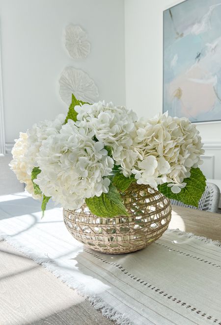 These real-touch hydrangeas from Amazon are so incredibly realistic looking and are very well priced! 
-
Coastal home, coastal style, coastal decor, Amazon home decor, amazon hydrangeas, white hydrangeas, dining room decor, dining room table decor, Amazon faux flowers, faux hydrangeas, Amazon home decor, beach home, beach house decor, beach house style, woven rope dining chair, coastal dining chairs, coastal dining room decor, lemon drop artwork, coastal artwork, coastal abstract art, dining room art, extending dining table, pottery barn dining table, coastal dining table, white coral wall decor, coral shaped paper decor, Amazon wall decor, cayman vase, glass vase, artificial hydrangea flower, woven vase, seagrass vase, large vase, spring Amazon decor 

#LTKfindsunder50 #LTKfindsunder100 #LTKhome