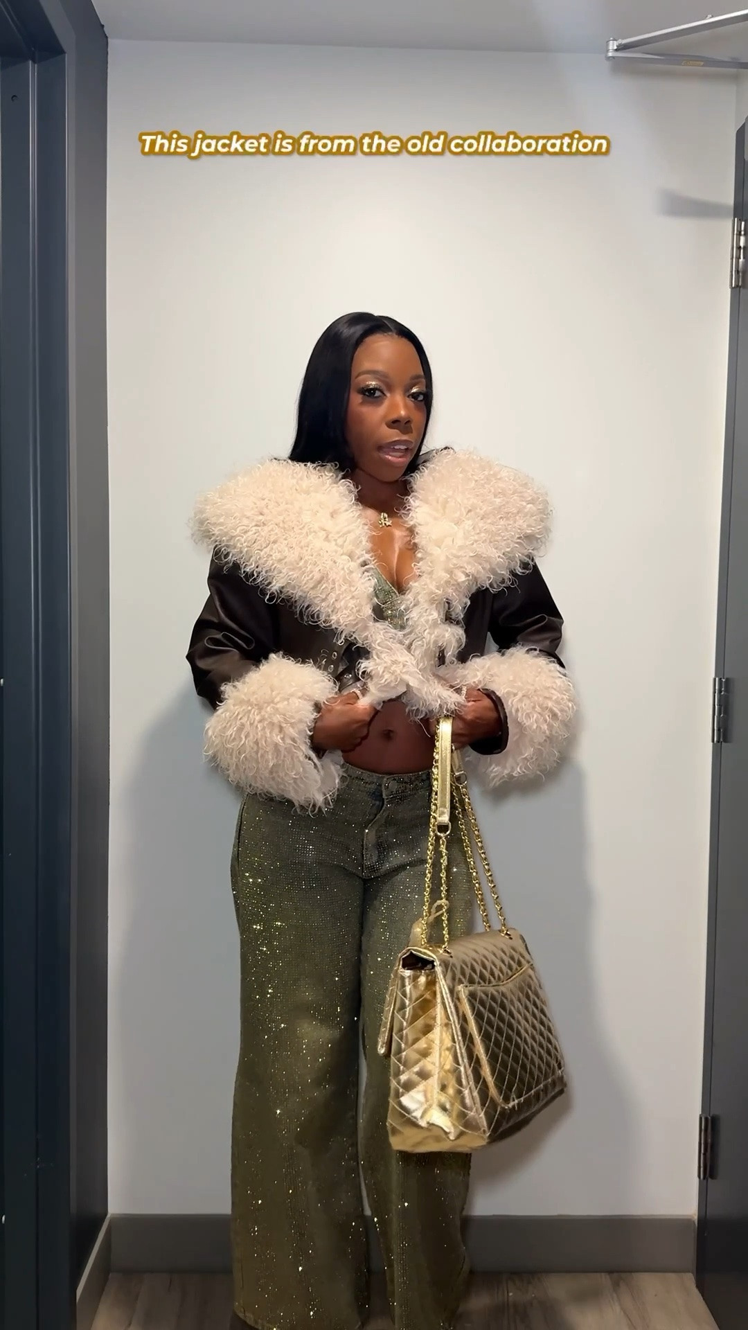NYC fit check 🗽✨ I wore this denim and gold rhinestone set from Windsor on my recent trip to New York, and it was a hit!

I love how the outfit shines when the light hits it. I am wearing the halter top in a size small, and the wide leg jeans in a size medium (they run a little small, but they’re tall girl friendly).

I threw on a previously gifted cropped leather jacket from pretty little thing since it was chilly out, and finished the look with an oversized gold quilted Chanel-inspired purse, and gold platform sandals. ￼