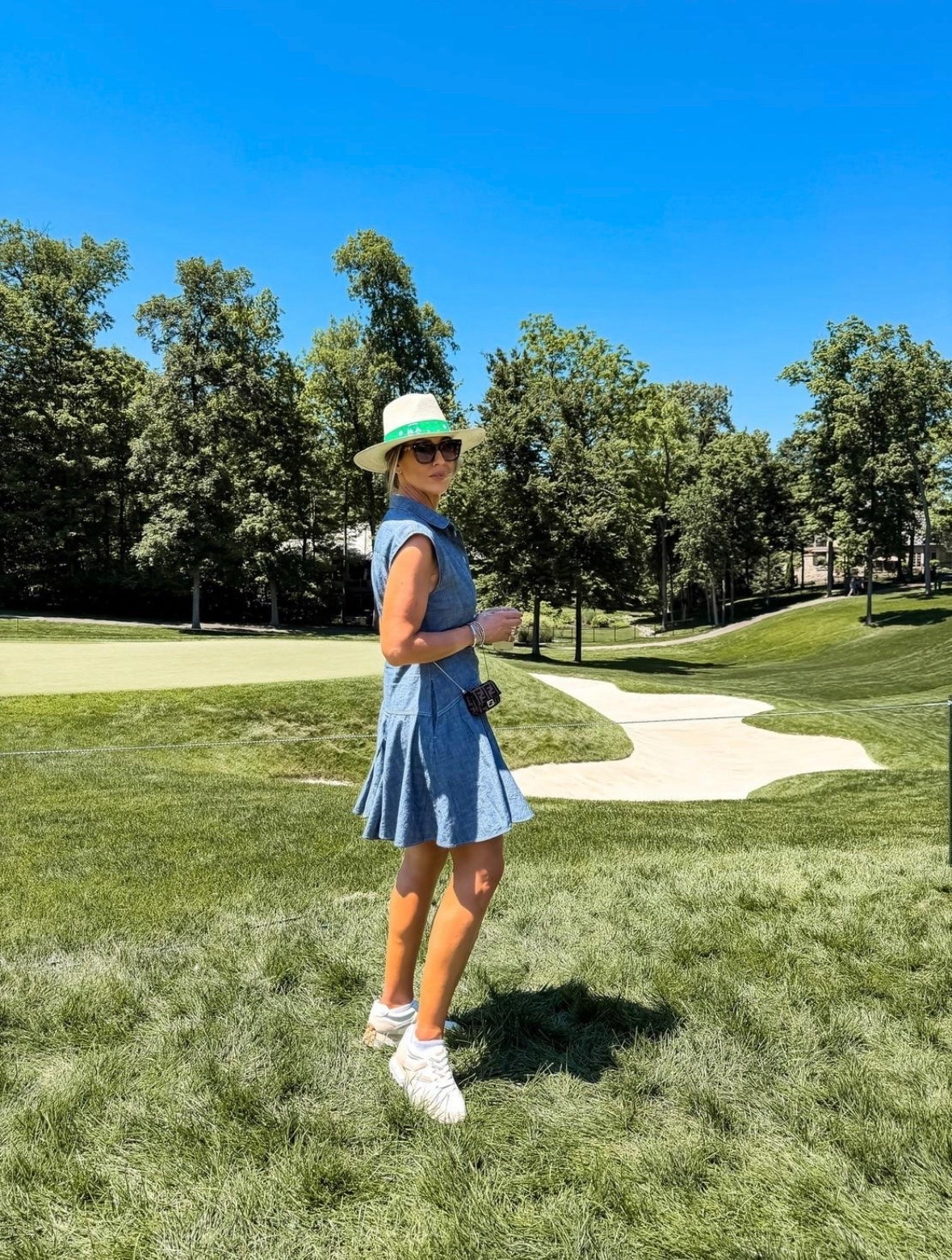 This chambray dress is one of those pieces that looks polished but still feels easy enough for a full day out. The fit is flattering without being clingy, and I love that it works just as well with sneakers on the golf course as it would with sandals for lunch. Wearing a medium.

chambray dress, denim dress, casual dress, golf outfit, resort wear, summer dress, sneakers with dress, everyday style, vacation outfit, elevated casual, TheMomInStyle

#LTKootd #LTKSeasonal #LTKOver40
