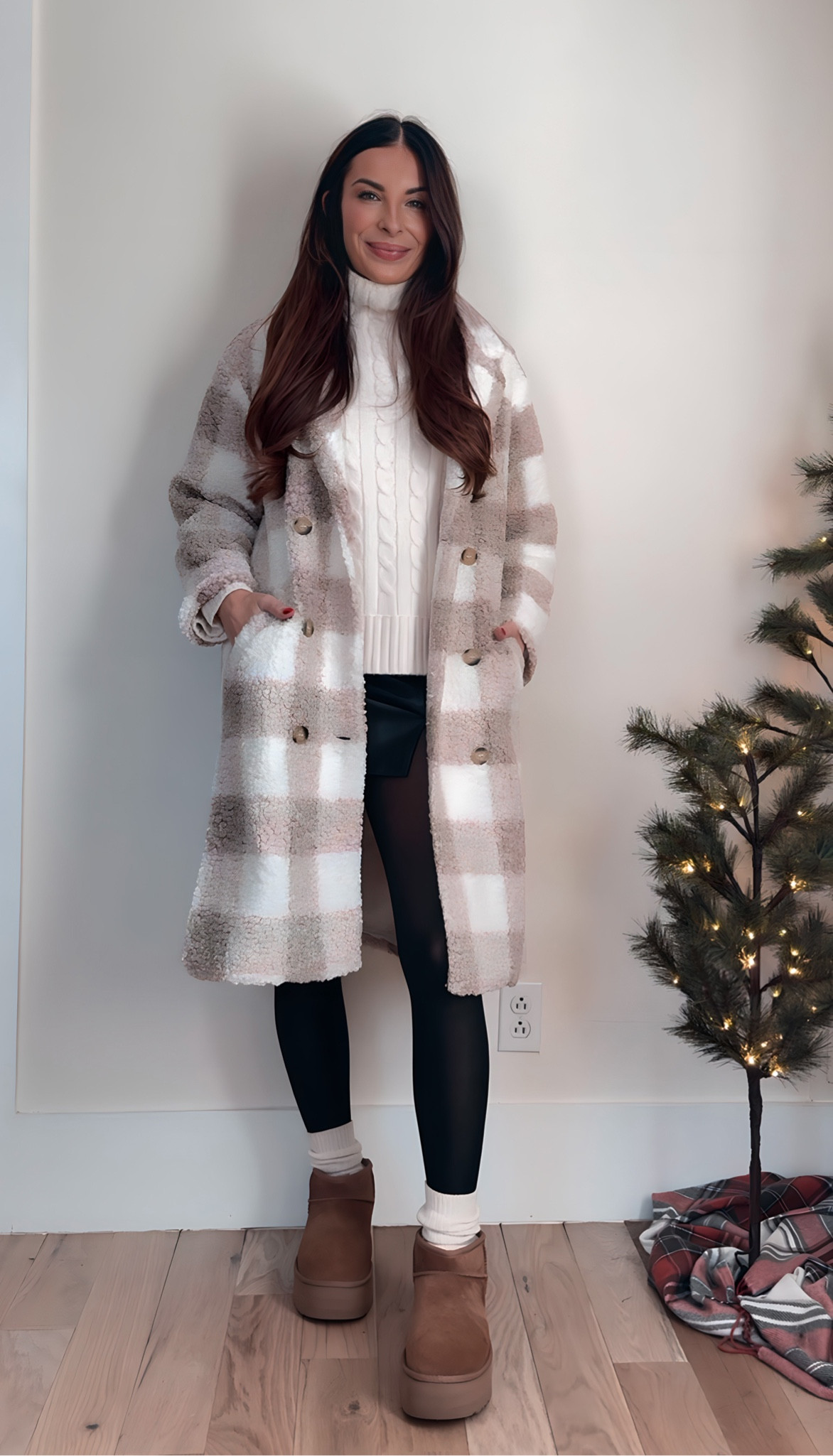 The prettiest longline plaid Sherpa coat that will go with everything this season and many more to come! Paired with a black leather skirt, cream cable knit sweater, black sheer tights, and Ugg ultra minis! 

For Pink Lily, use code DECEMBER20 at checkout! 

#LTKfindsunder100 #LTKHoliday #LTKstyletip