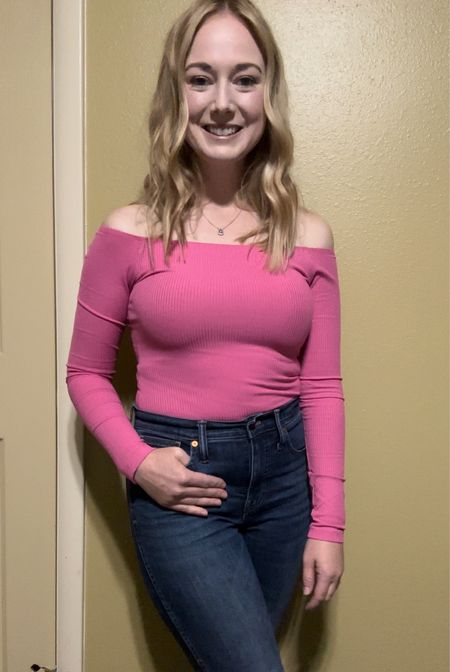 My off the shoulder hot pink body suit is under $12 right now. I’m wearing a small, but could have done a medium. My high rise skinny jeans are a size 26 and tts. Pair with a cute pair of white booties for Fall. #barbiecore #bodysuitstyle #skinnyjeanstyle #datenightlooks #momoutfit 

#LTKxMadewell #LTKfindsunder50 #LTKSeasonal
