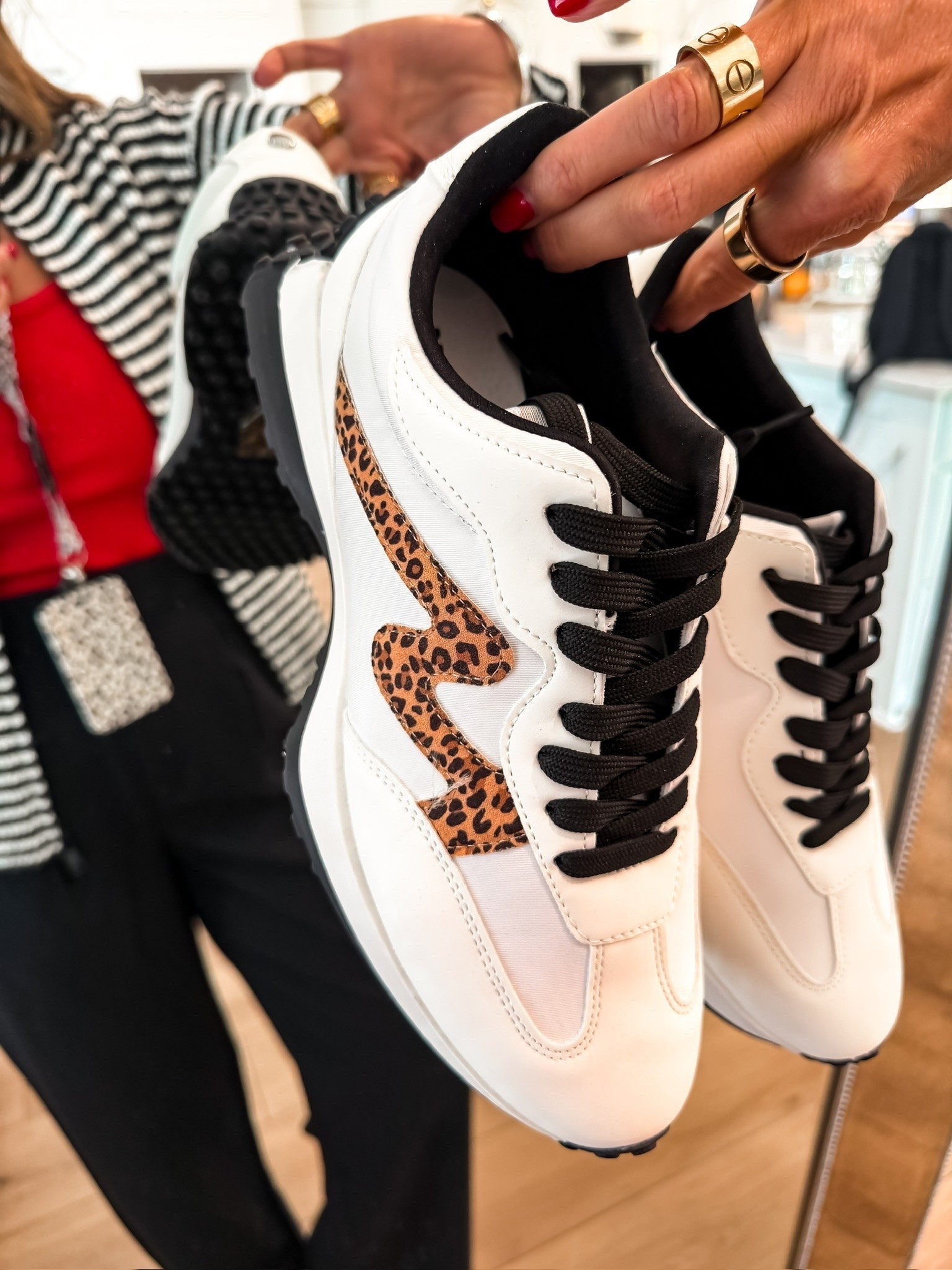 These sneakers add just enough personality to a basic outfit without becoming hard to style. The black laces and leopard detail stand out against the white upper, while the cushioned shape keeps them practical for long days on your feet.

leopard sneakers, white sneakers, casual shoes, everyday sneakers, comfortable footwear, statement sneakers, fall outfit shoes, neutral sneakers, teacher style, women’s fashion, TheMomInStyle

#LTKTravel #LTKootd #LTKOver40