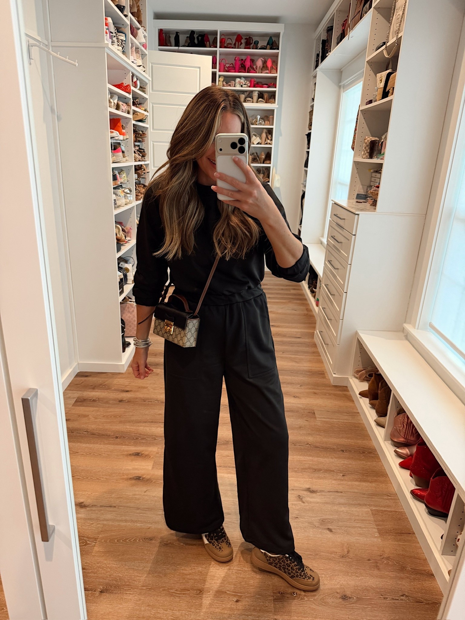 In a medium wide leg jumpsuit, sneakers and accessories - fits tts.

#LTKSeasonal #LTKStyleTip #LTKFindsUnder50