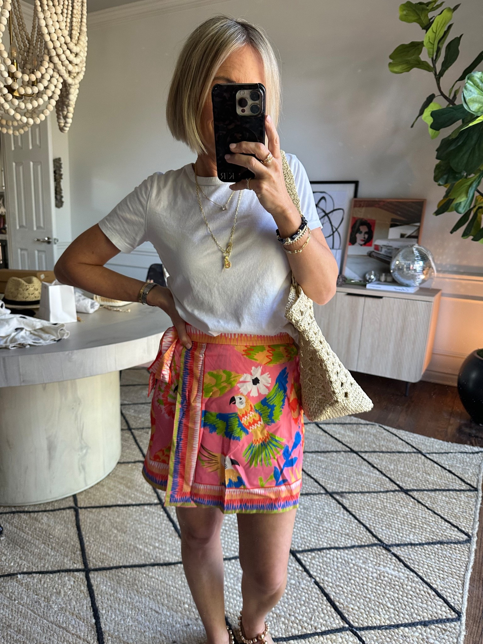 Farm Rio or Amazon?!?  Wearing this adorable skirt in an xs.  Just went a classic white tee, and a little straw tote from Target.
Would wear to dinner on Spring Breakk

#LTKootd #LTKOver40 #LTKTravel