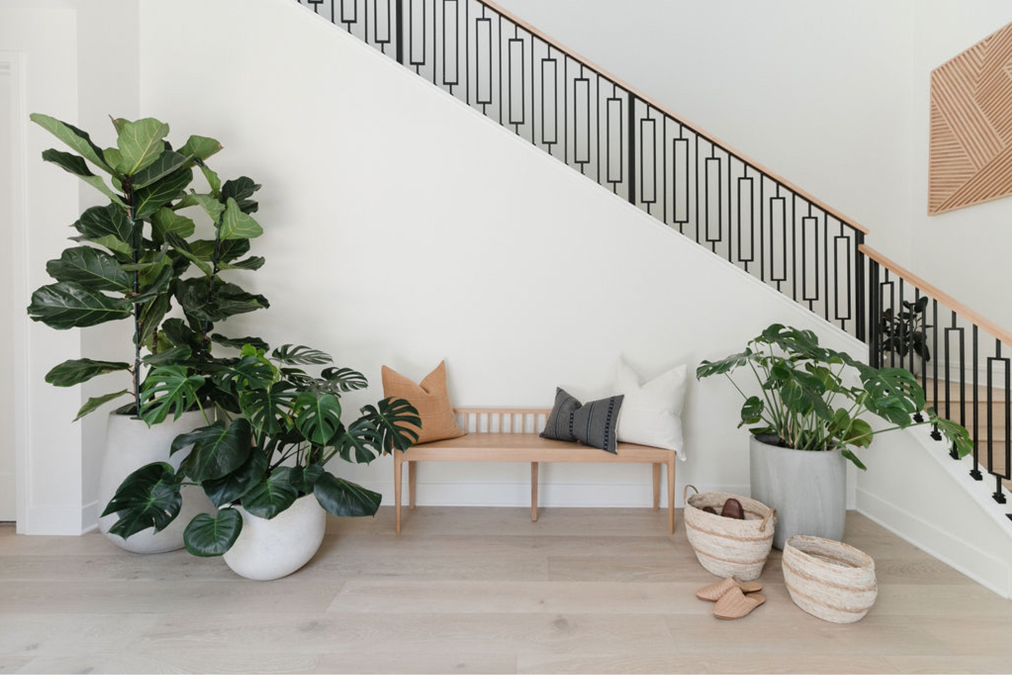 This entryway encompasses the modern coastal design aesthetic of the home and we love how light, bright, and welcoming it is. 

#moderncoastaldesign #entryway #interiordesign #homedecor 

#LTKSeasonal #LTKunder100 #LTKhome