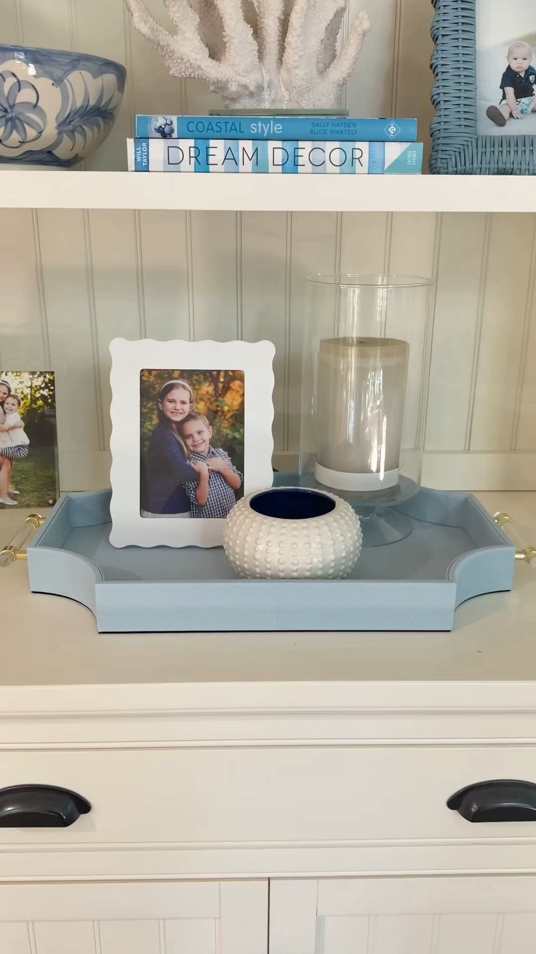 Light blue faux leather, acrylic handles, brass detail — this tray has everything 🤍 It is such a beautiful and versatile styling piece. It’s perfect as a coffee table centerpiece, a shelf styling accent, a nightstand tray, or a console table moment. The mixed materials give it such an elevated and collected look and it is the kind of coastal home decor find that makes a whole space feel so intentional.

#LTKHome #LTKSaleAlert #LTKU