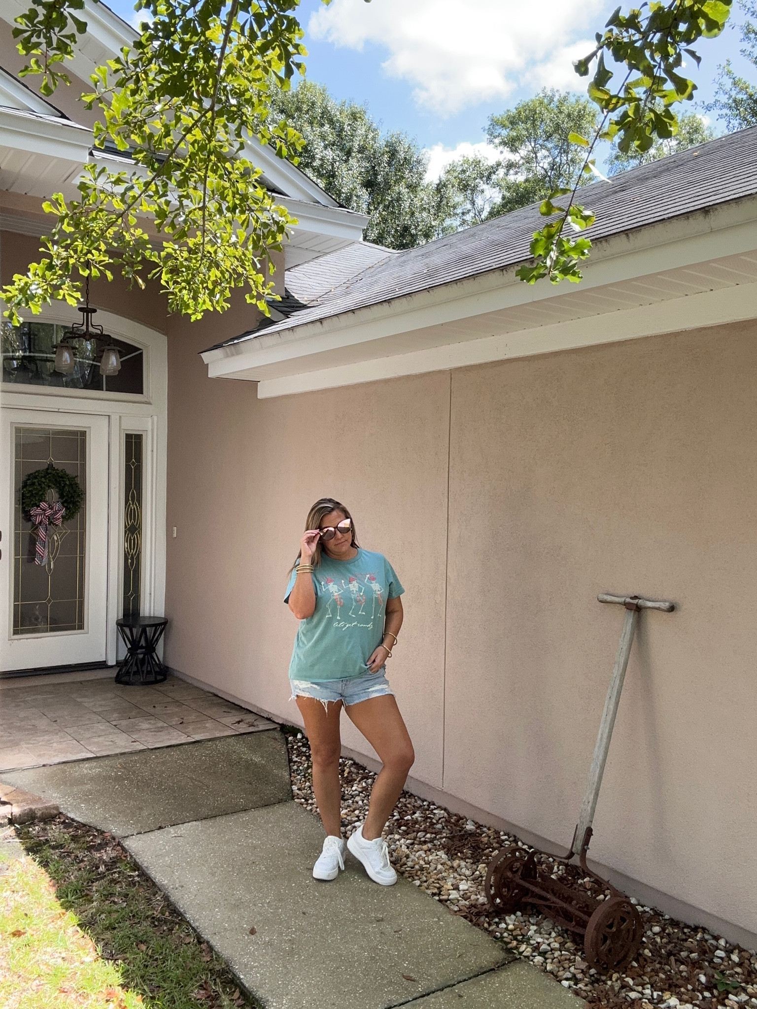 Graphic tees
Target 
Sunglasses 
American Eagle
Distressed Jean shorts 
Rhinestone sneakers 

#LTKMidsize #LTKFindsUnder50 #LTKOver40