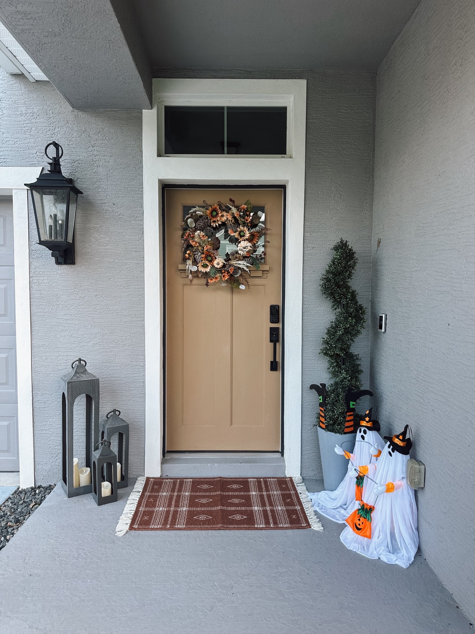 Fall Halloween porch decor simple and festive. Light up animated ghosts fall rug, lanterns and outdoor remote/timer candles fall wreath #fall #halloween #porchdecor #frontporch #halloweenwreath #fallwreath 

#LTKSeasonal #LTKHome #LTKHalloween