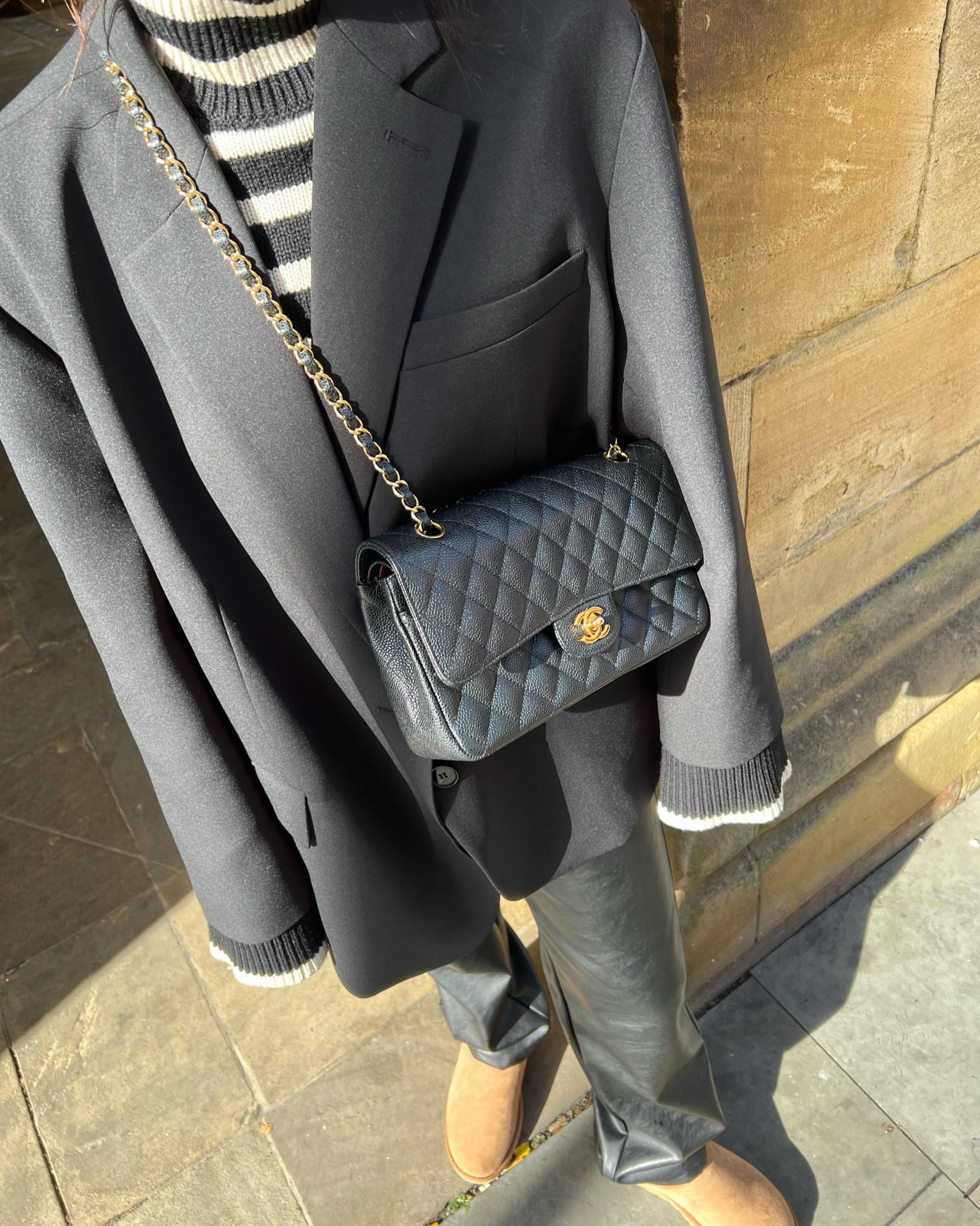 frankie shop Bea blazer in black 
ultra mini Uggs 
Toteme striped jumper 
arket striped jumper 
Rayban wayfarer sunglasses 
Sundarbay leather pants 
chanel handbag 
autumn style 
autumn outfit ideas 

#LTKSeasonal #LTKstyletip #LTKeurope