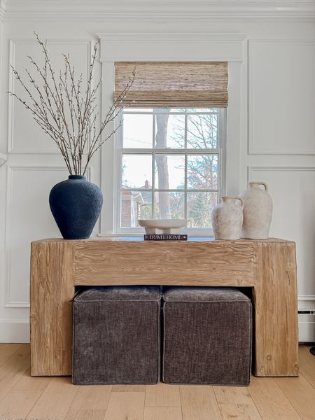 Rustic wood console table - window shades - vase - footed bowl
- book - black vase - artificial branches - spring decor - brown cube ottomans.




#LTKHome #LTKStyleTip #LTKSaleAlert