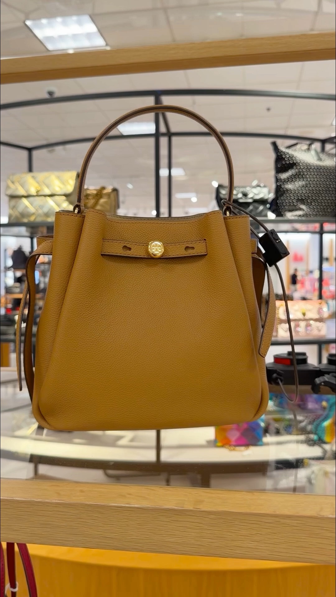 Treat yourself! Love this beautiful Tory Burch pebble leather crossbody bucket bag that’s perfect for spring and summer outfits. Available in several colors and the perfect size to carry all of your daily essentials! It has a magnetic snap closure, adjustable drawstring, top carry handle and an adjustable crossbody strap. Great for everyday wear, workwear and travel!
Now available in new suede and raffia options too! 

#LTKWorkwear #LTKOver40 #LTKTravel