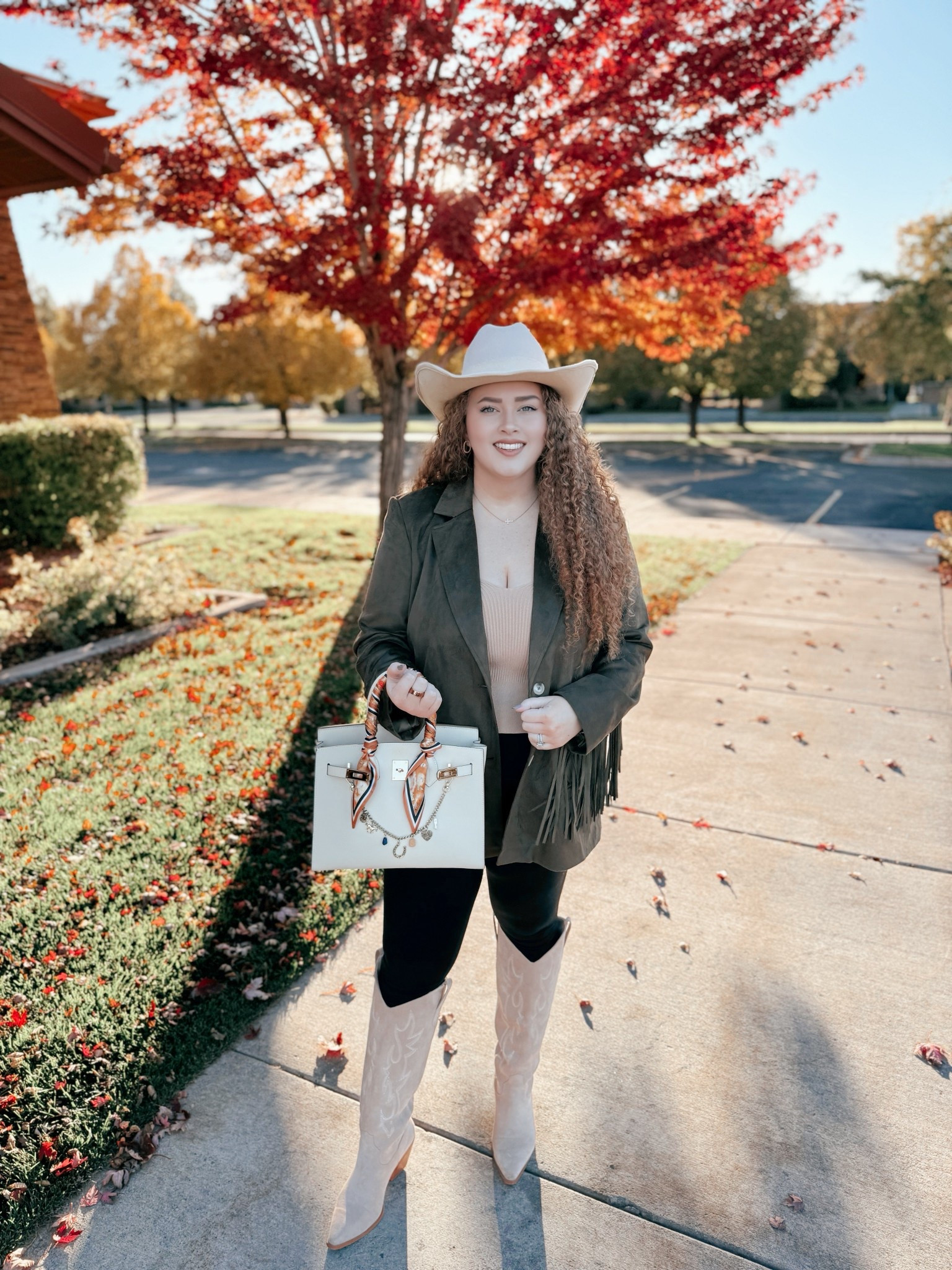 Channeling all the fall western vibes 🍂🤠 Suede, fringe, and boots that feel like they belong in a golden hour moment. Everything linked for your own cozy cowgirl look ✨Nashville outfit | Nashville bachelorette look | country concert outfit | western concert outfit | concert season | neutral cowgirl boots | amazon neutral cowgirl boots | suede cowgirl boots | amazon suede cowgirl boots | amazon boots | amazon finds | amazon fashion | amazon outfit | amazon look | amazon concert outfit | amazon concert finds | western concert outfit | western fashion | amazon western fashion | amazon western outfit | leggings | amazon leggings | fall leggings outfit| amazon tank top | amazon neutral tank top | blazer | amazon blazer | green blazer | amazon green blazer | fringe blazer | amazon fringe blazer | cowgirl hat | amazon cowgirl hat  

#LTKSaleAlert #LTKMidsize #LTKStyleTip