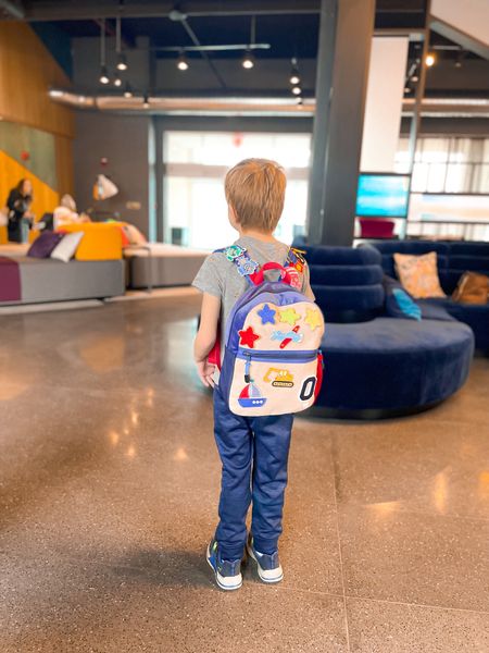 #ad Our most loved travel item recently has been our @beccobags backpack. My kids love that they have removable patches that can be organized and moved around as many times as they like!

I love the sensory aspect of that patches too and that they can serve as a relaxation tool.

They also hold the perfect amount of stuff and are easy for kids to carry! Besides backpacks, Becco also has customizable duffles, crossbody, and other bags.

Shop all their options in my LTK shop. 

#

#LTKtravel #LTKfamily #LTKkids