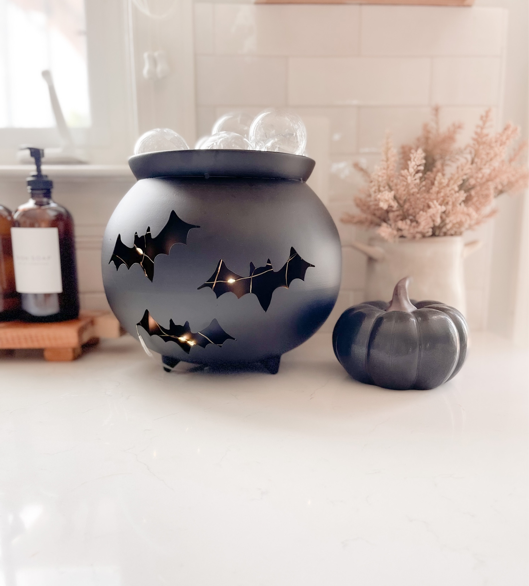 Fall home tour, diy bubbly cauldron from @threetimesahome

#LTKHalloween #LTKhome #LTKSeasonal